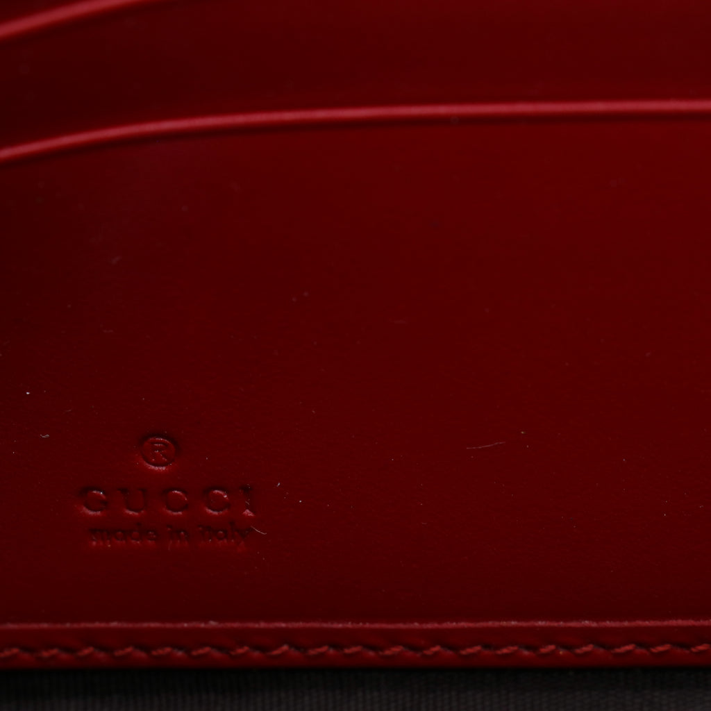 Gucci Guccissima Bow Zip Around Wallet W21231