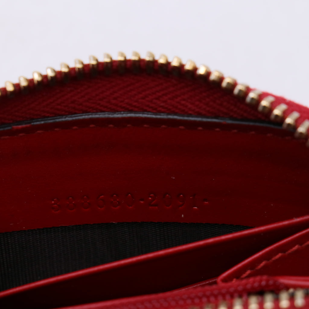 Gucci Guccissima Bow Zip Around Wallet W21231