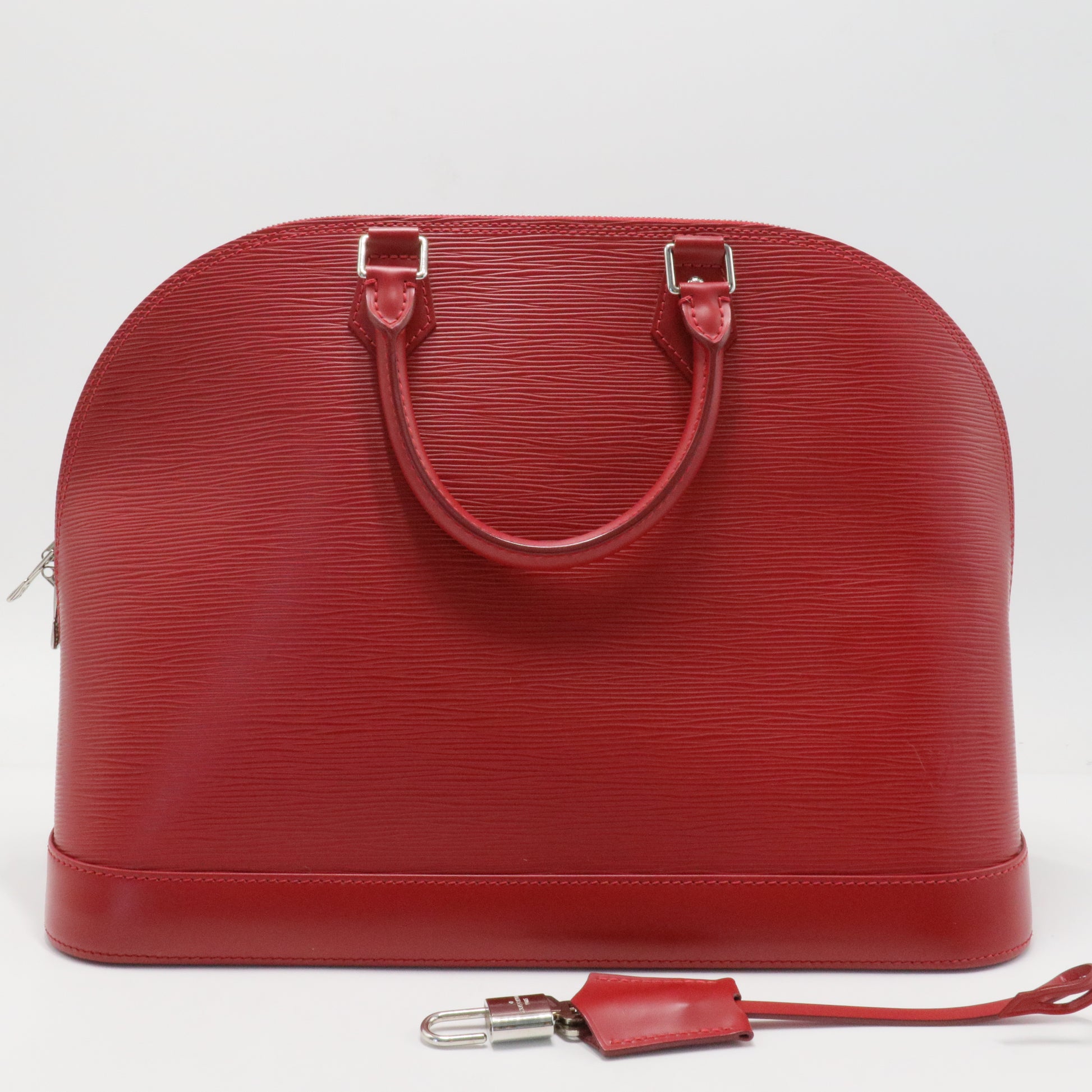 Alma Handbag Electric Epi Leather MM