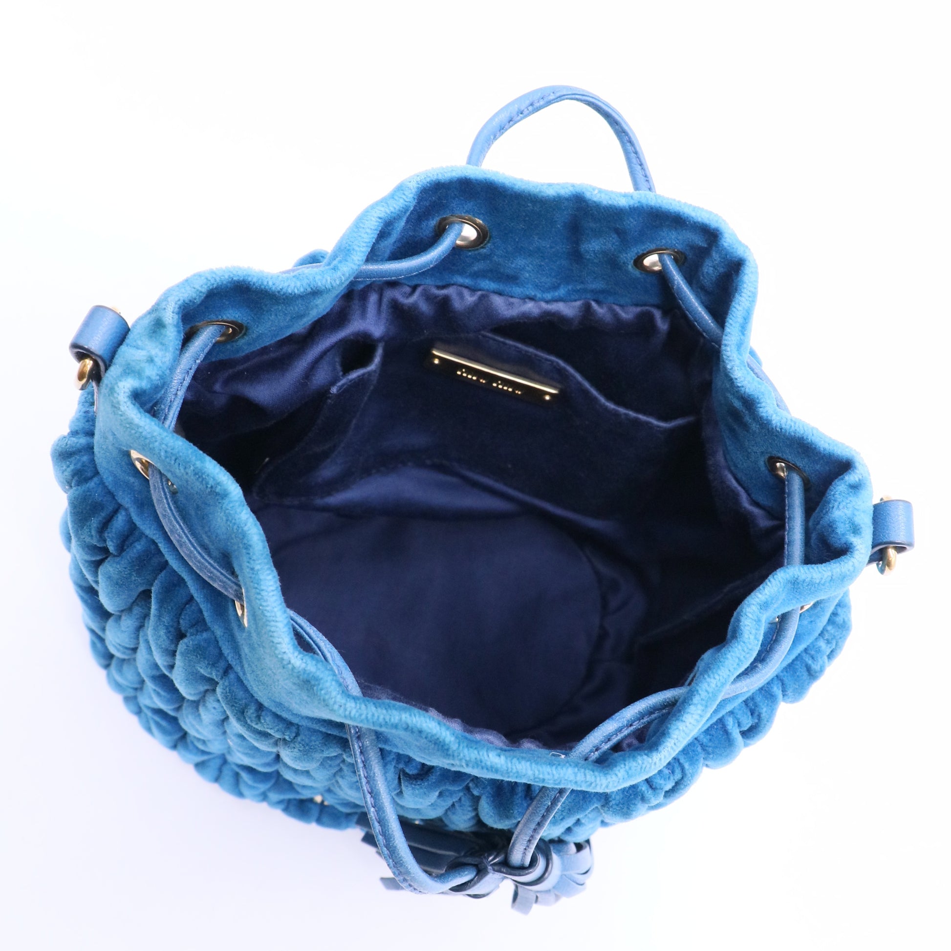 Blue velvet pleated bag