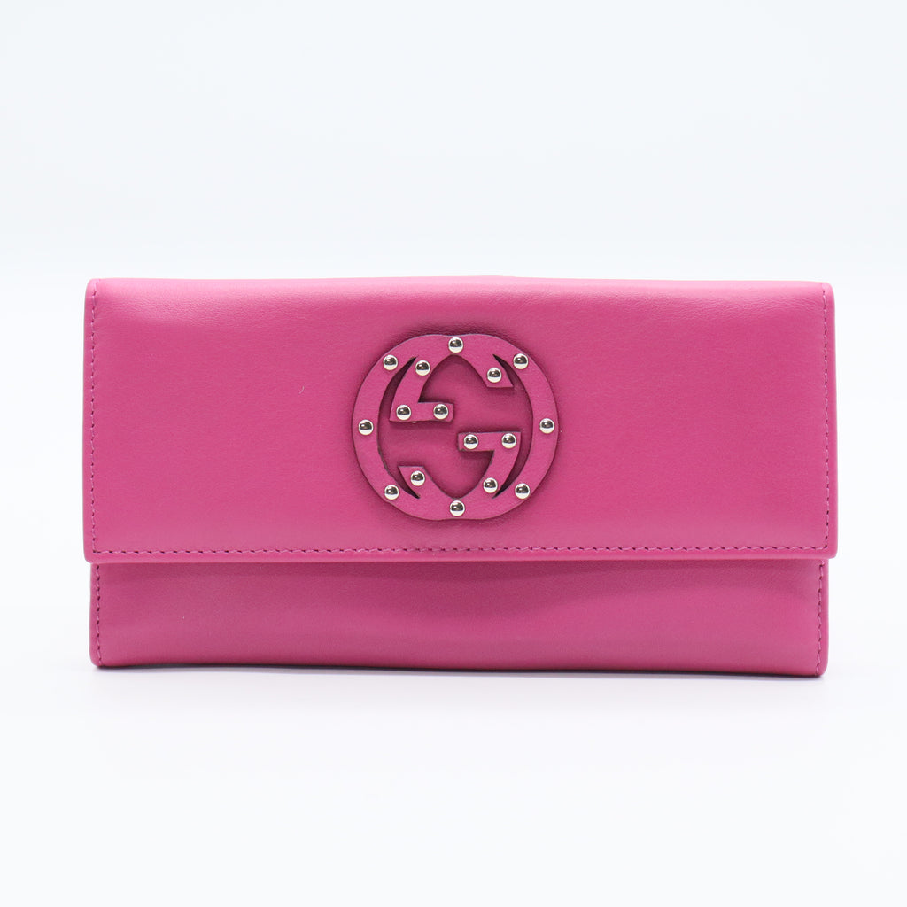Gucci Interlocking Studded Continental Flap Wallet in a pink