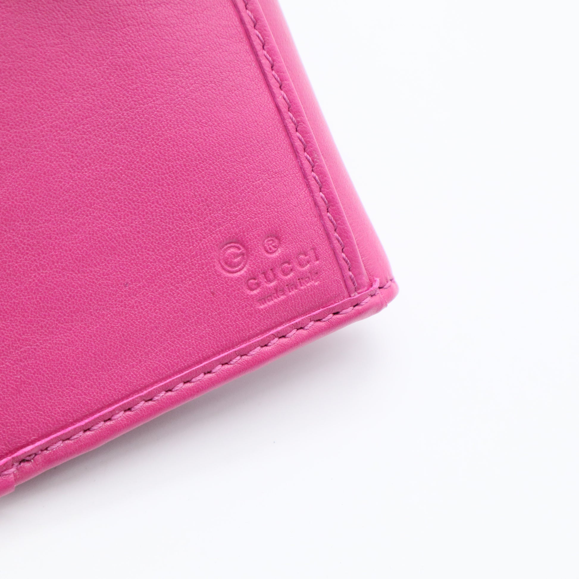 Gucci Interlocking Studded Continental Flap Wallet in a pink