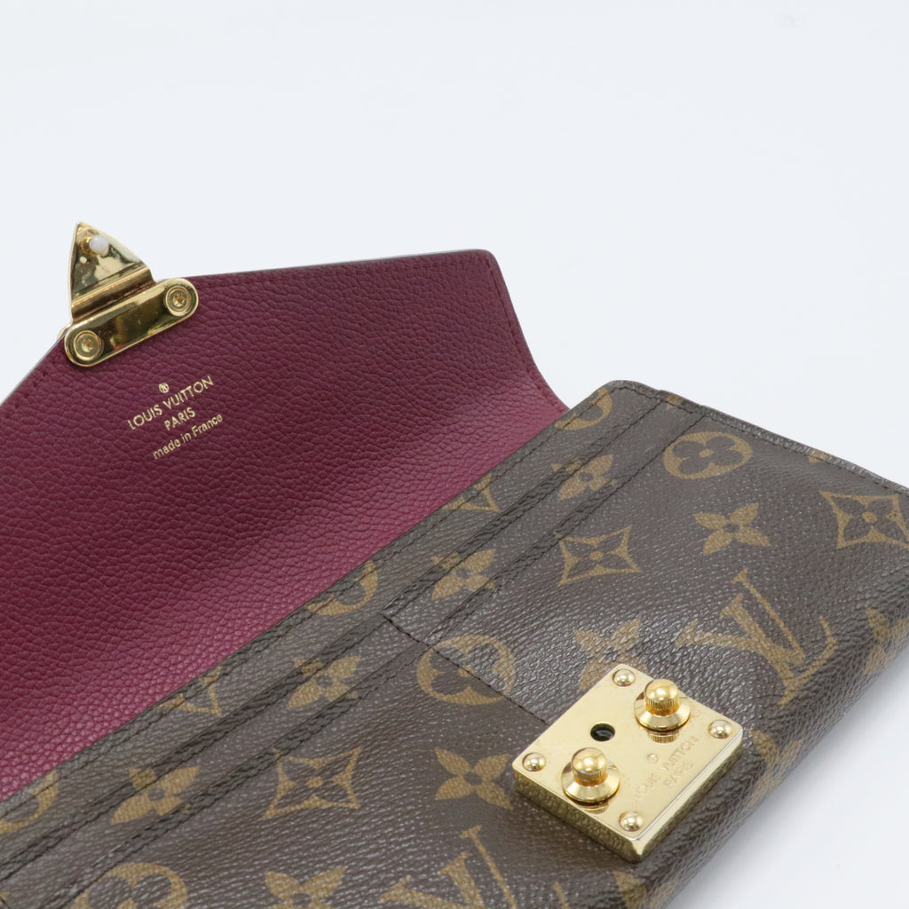 Pallas Wallet Monogram Canvas and Calfskin