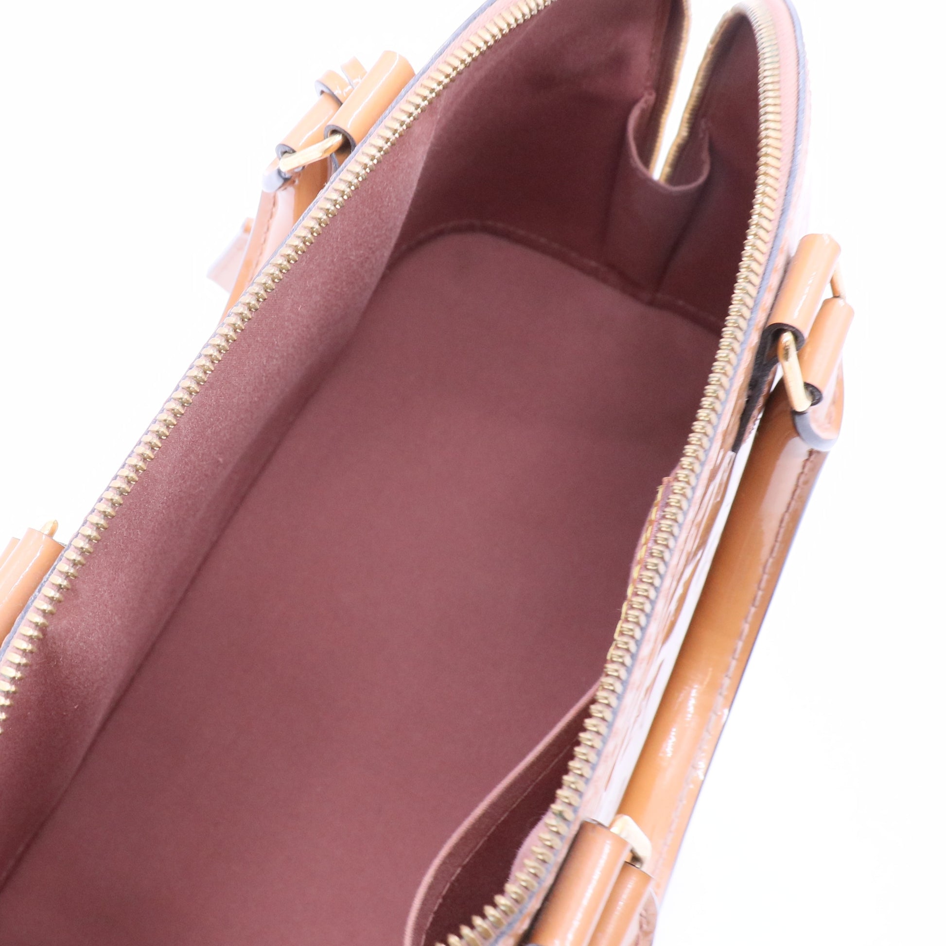 Monogram Vernis Alma PM