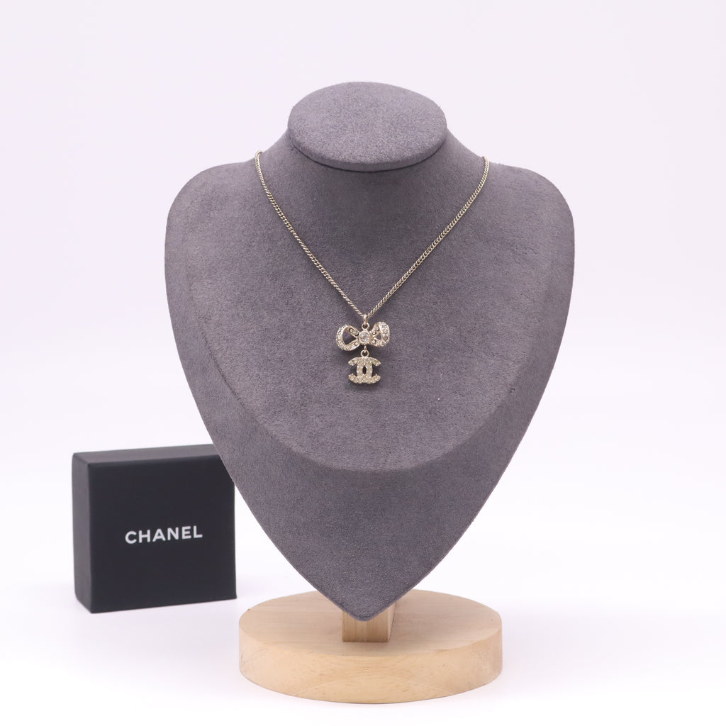 Chanel CC Rhinestone Bow Pendant Necklace W22453
