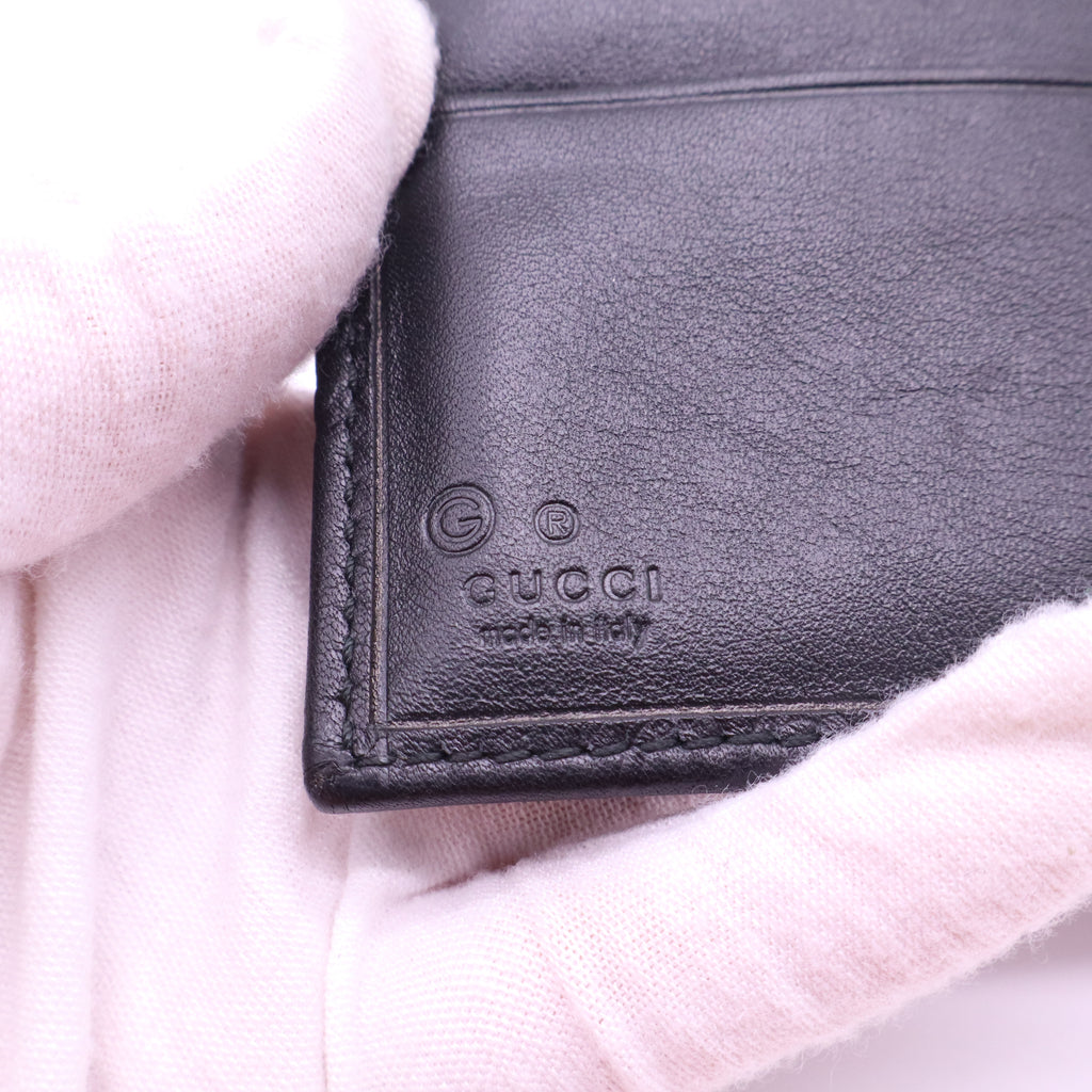 Gucci Signature Leather Bi-Fold Wallet W21307