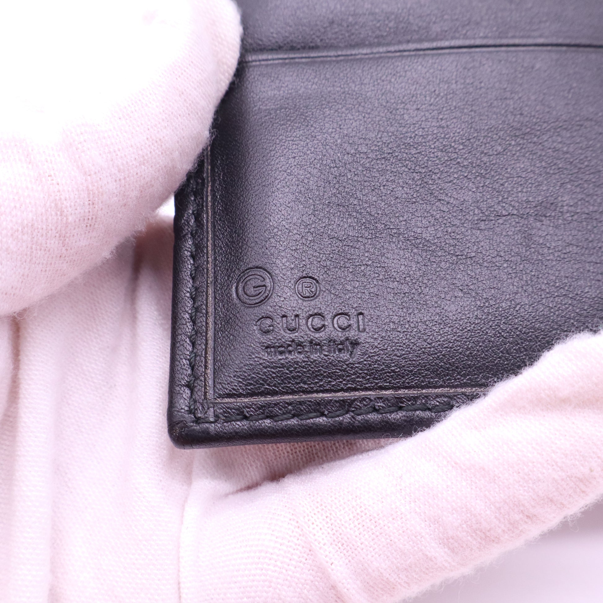 Gucci Signature Leather Bi-Fold Wallet W21307