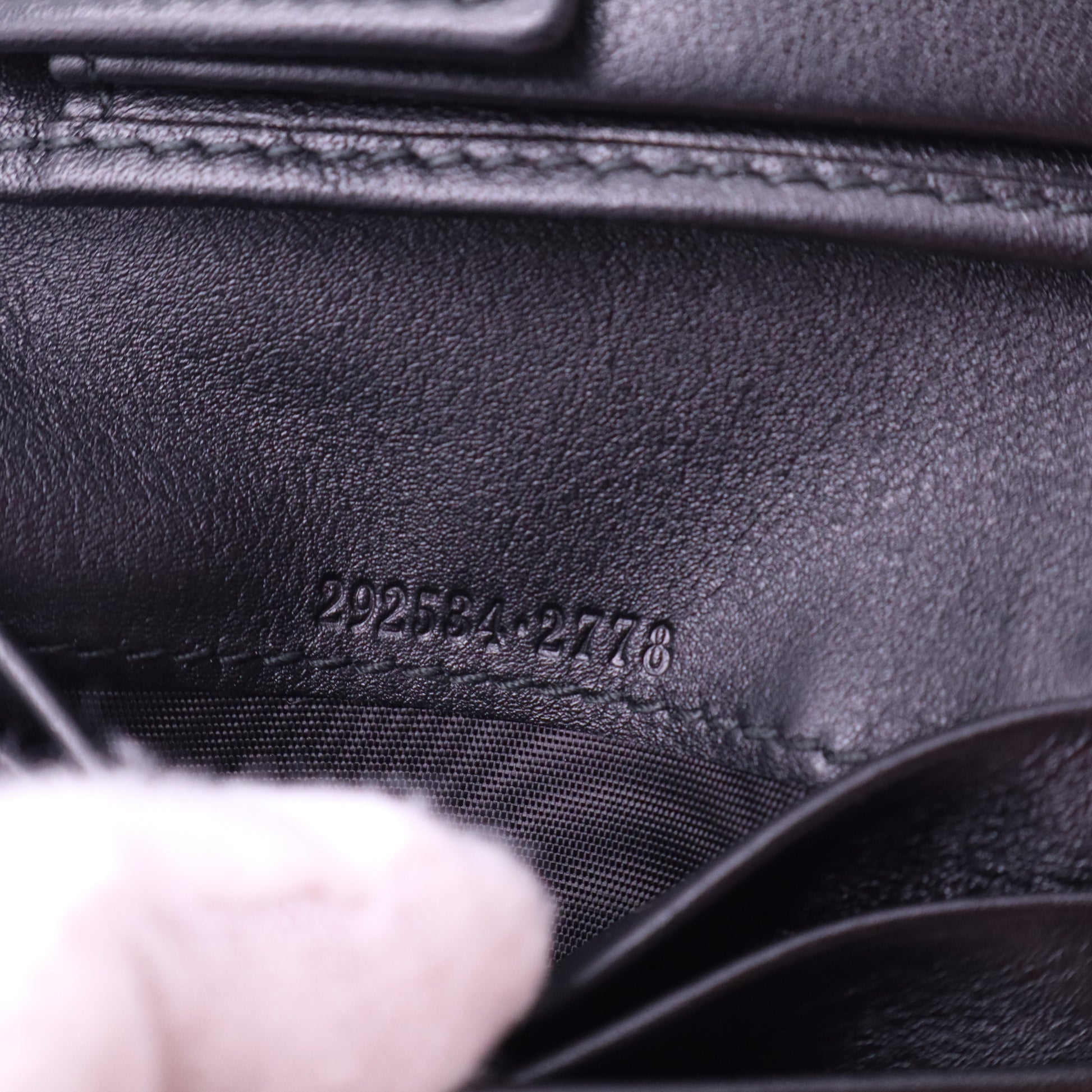 Gucci Signature Leather Bi-Fold Wallet W21307