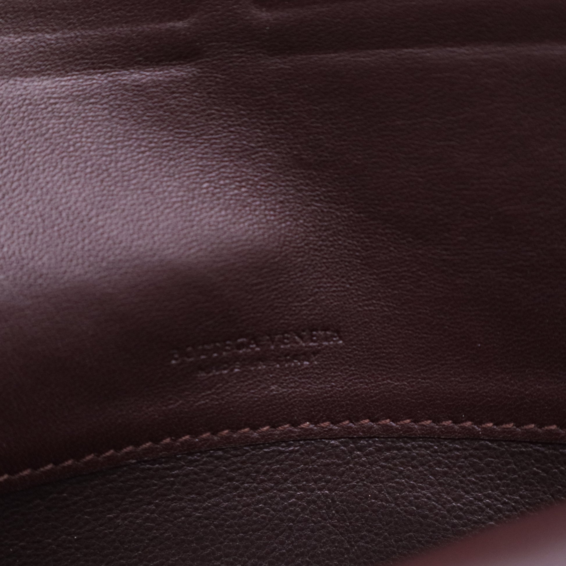 Intrecciato Woven Nappa Leather Double Flap Wallet