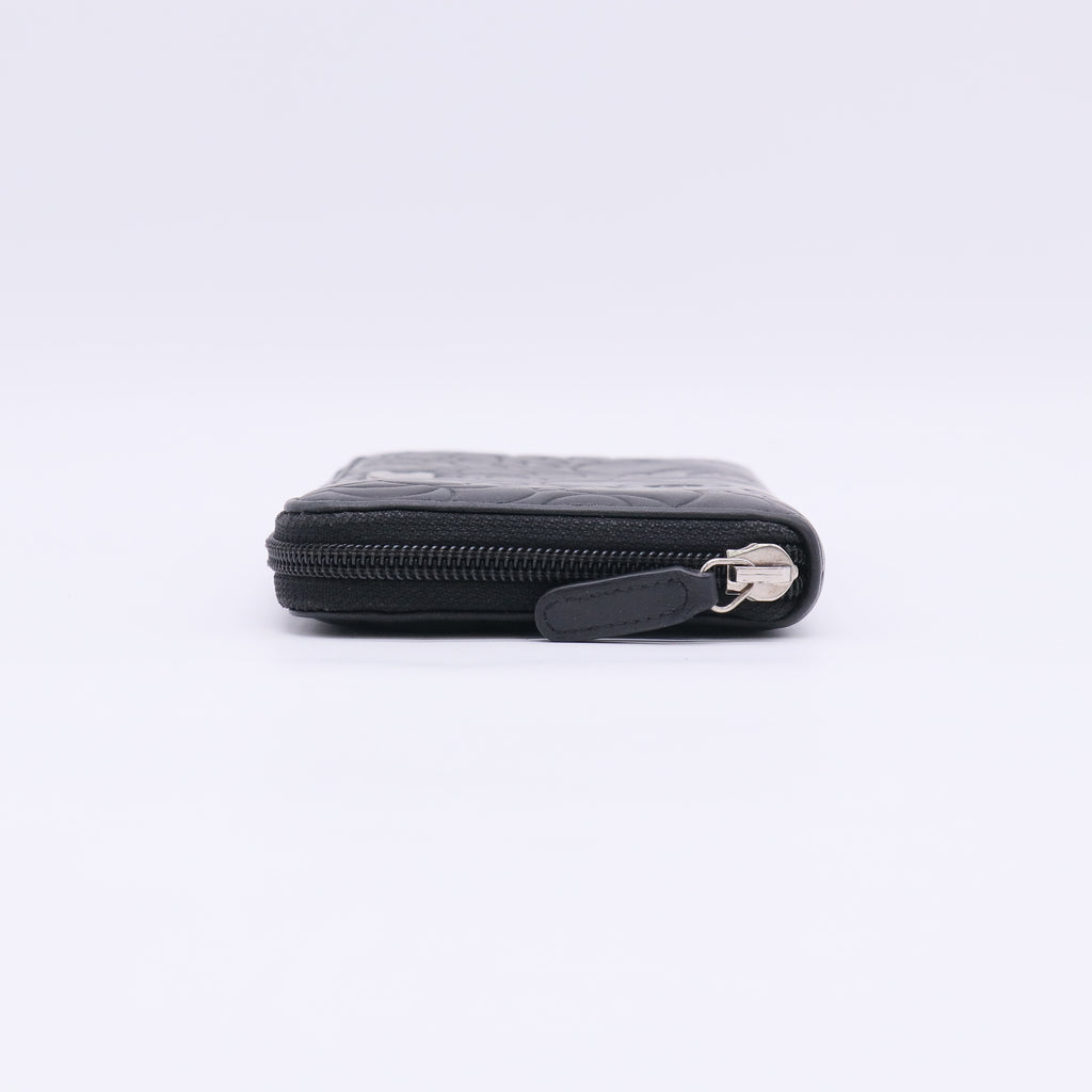 Chanel Camellia Embossed Lambskin Leather Zip Around Long Wallet W22900