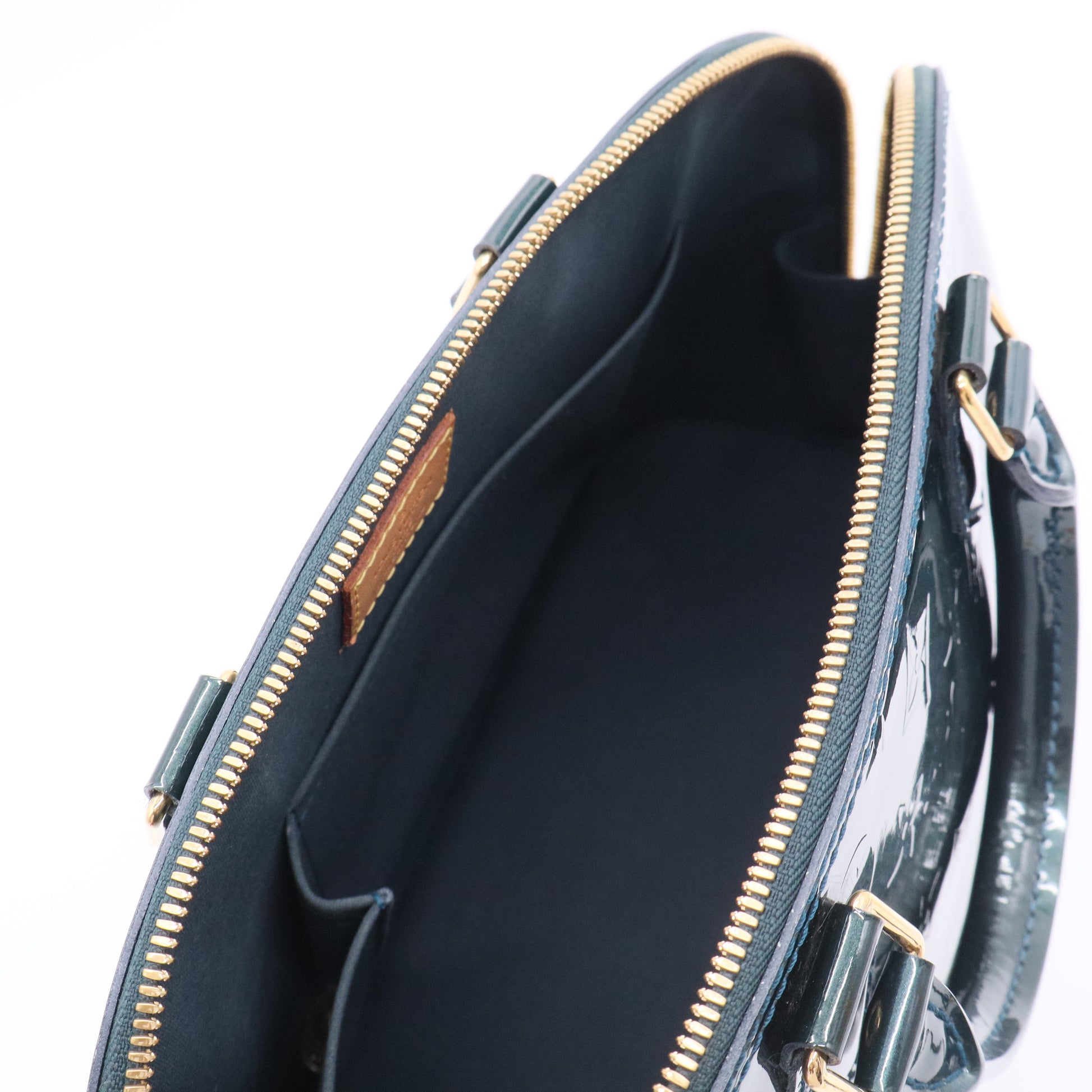 Alma Handbag Monogram Vernis PM