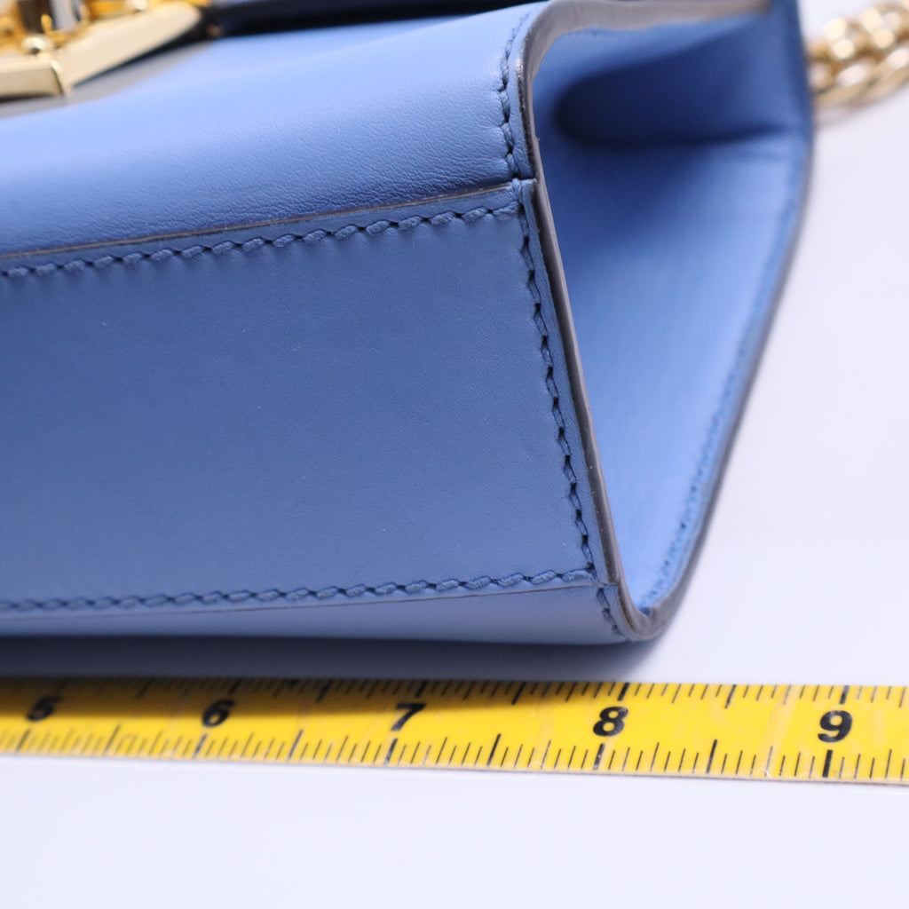 Padlock handbag featuring light blue B20556