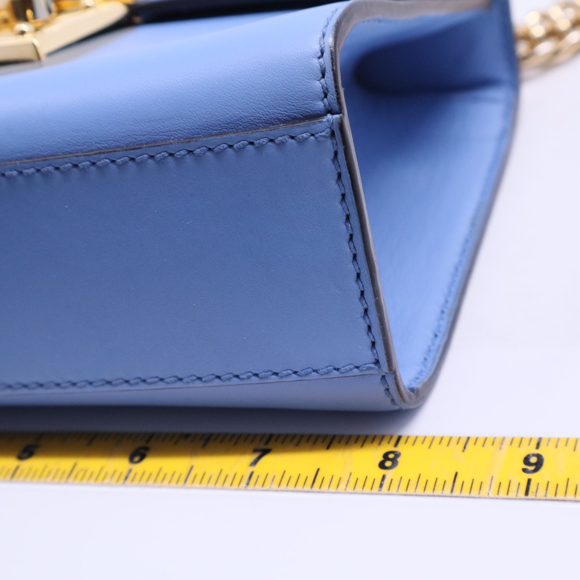 Padlock handbag featuring light blue B20556