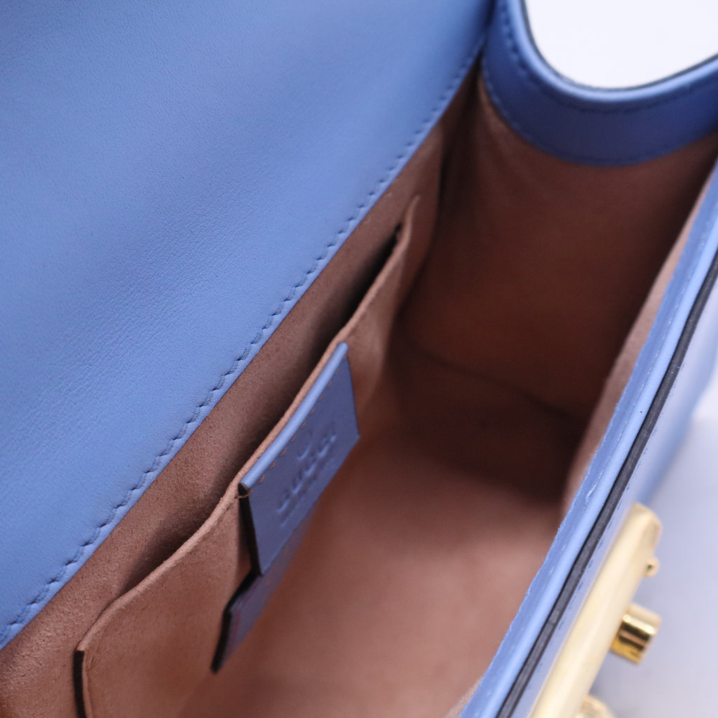 Padlock handbag featuring light blue B20556