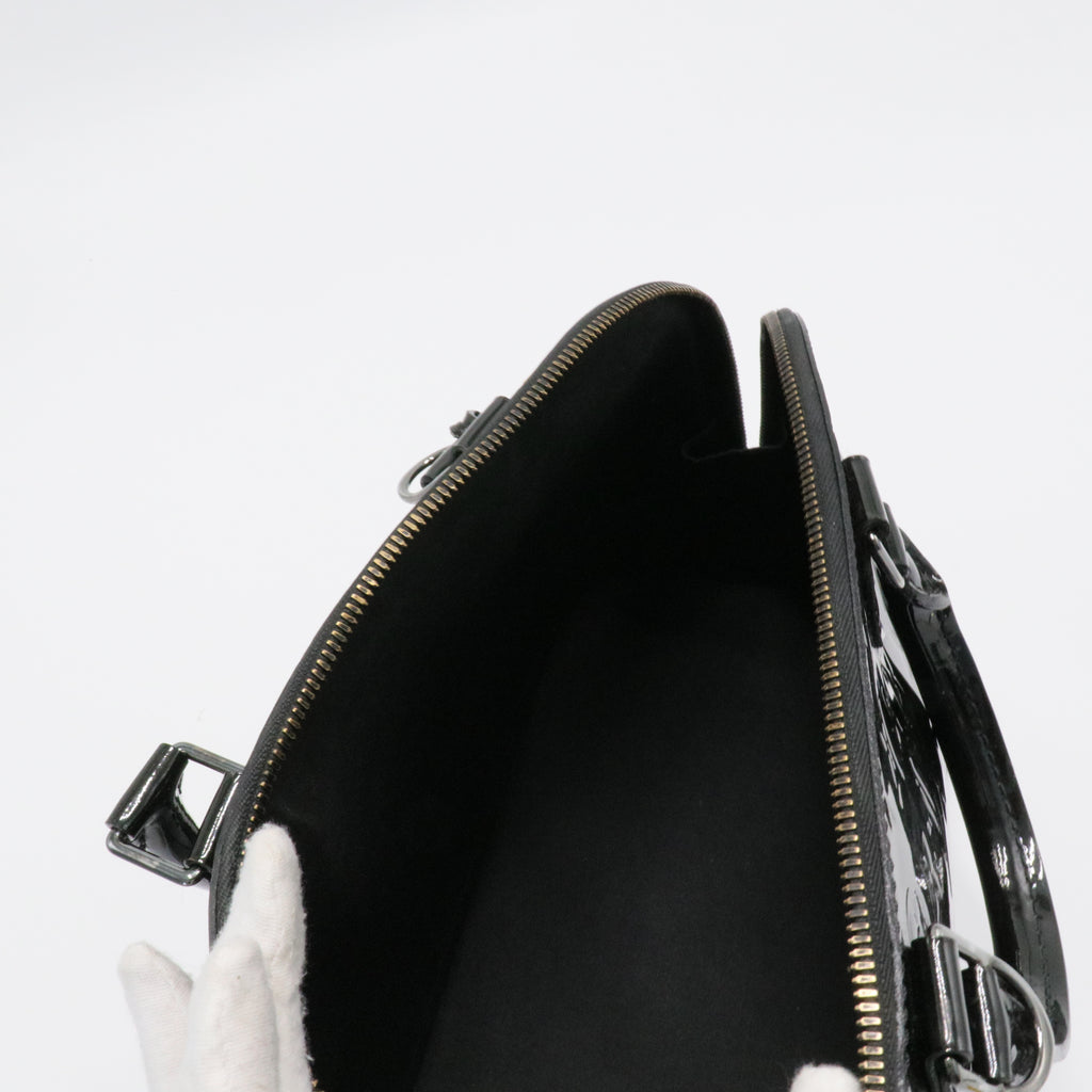 Alma Handbag Monogram Vernis MM