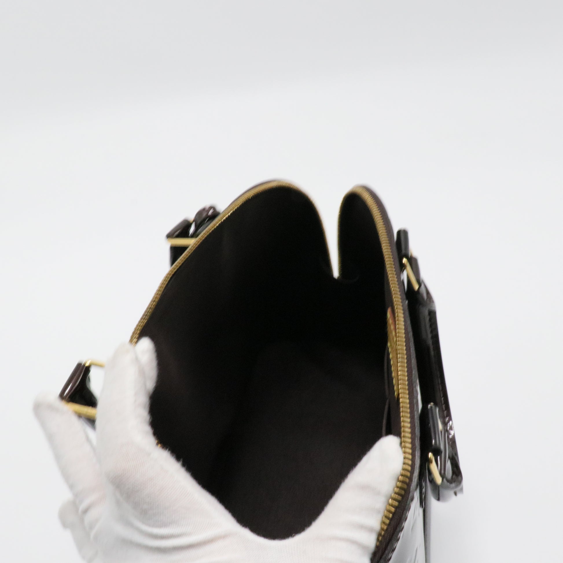 Alma Handbag Monogram Vernis