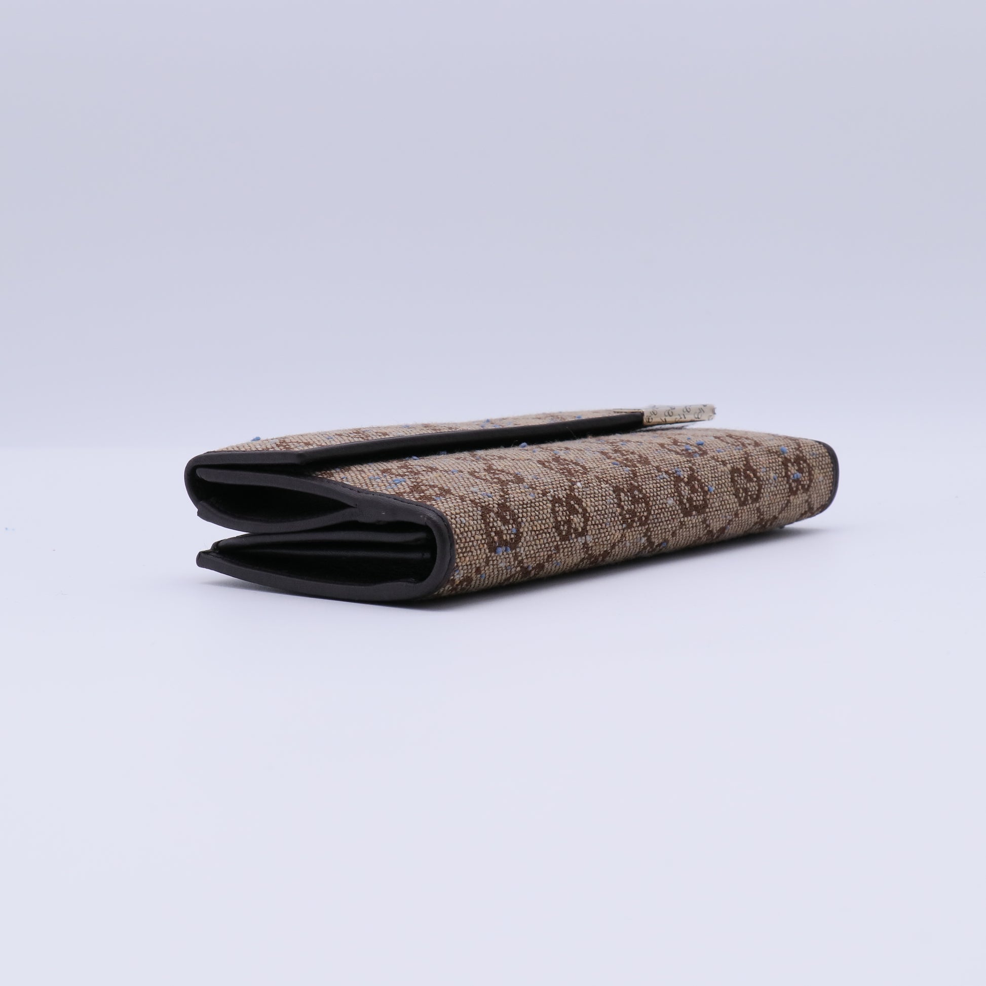 Gucci GG Canvas Metal Bar Trifold Wallet W21426