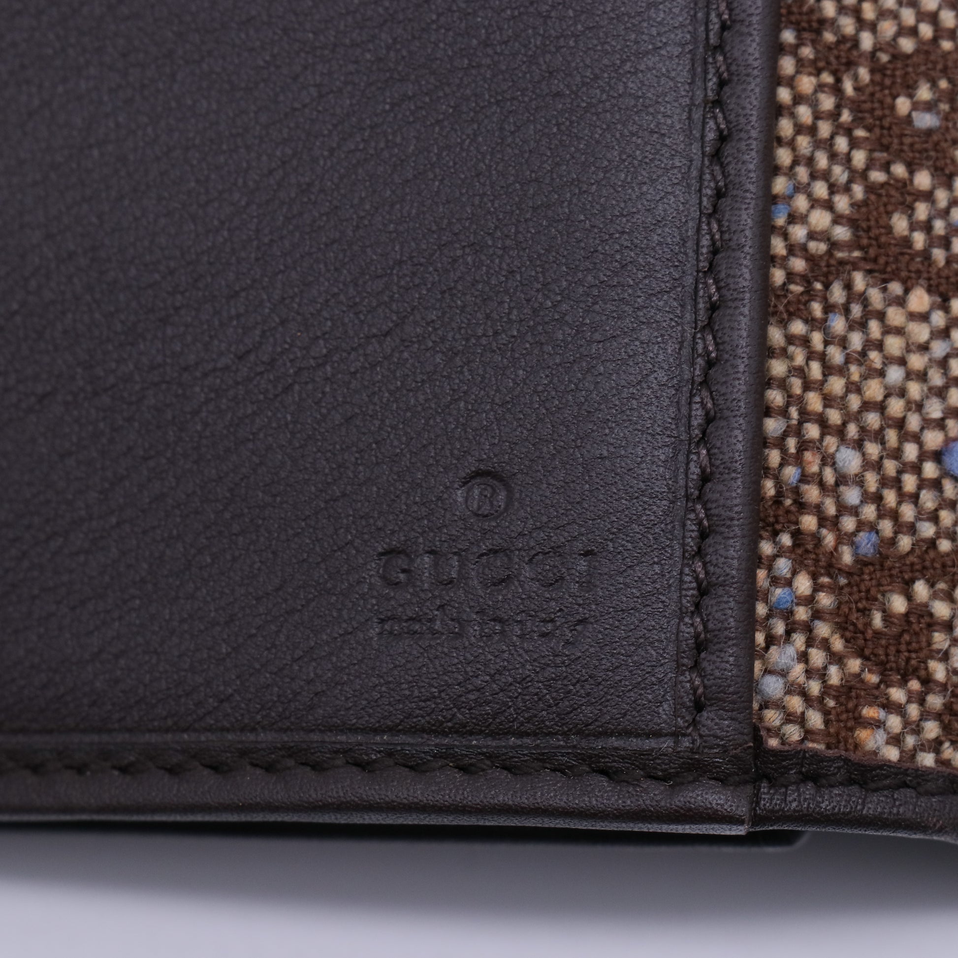 Gucci GG Canvas Metal Bar Trifold Wallet W21426