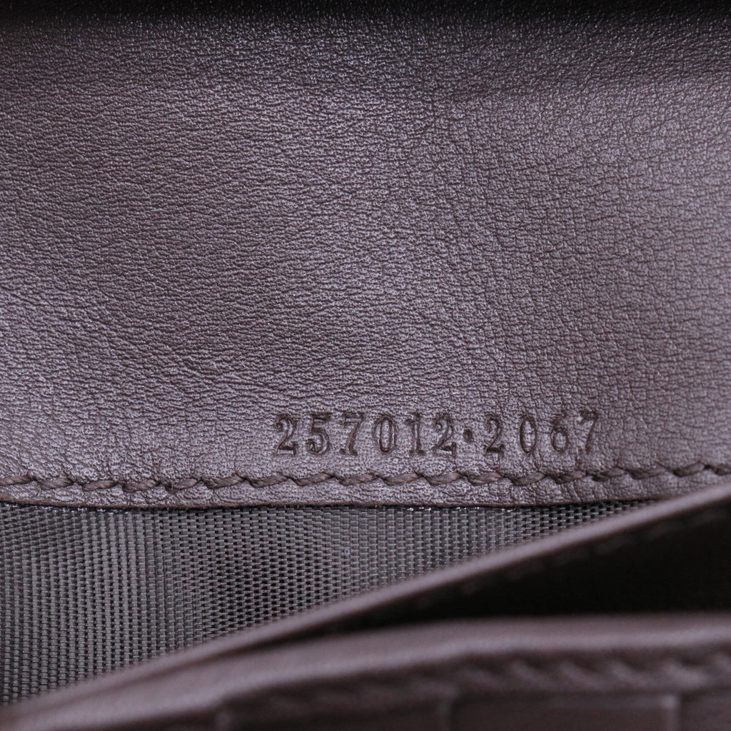 Gucci GG Canvas Metal Bar Trifold Wallet W21426