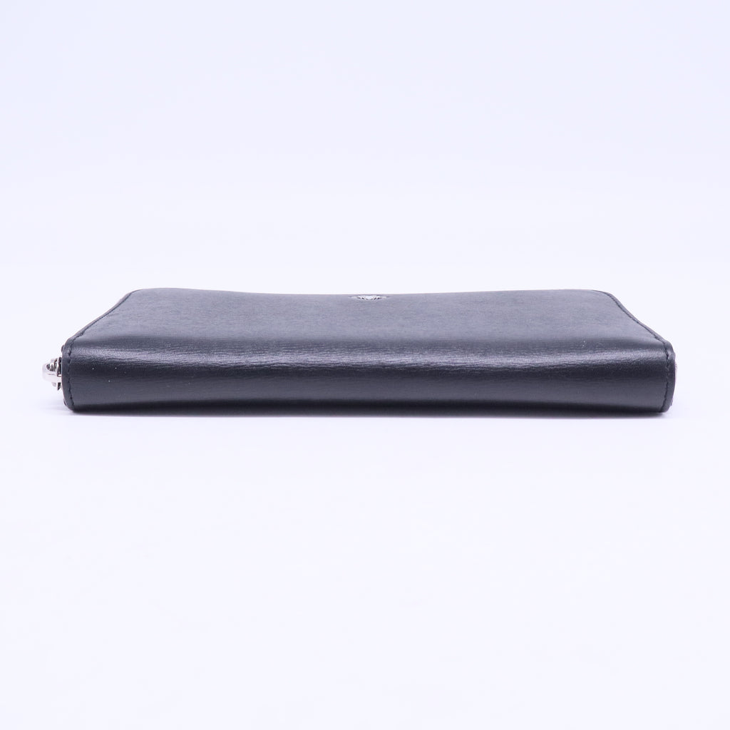 Black leather wallet with a metal bee motif W20553