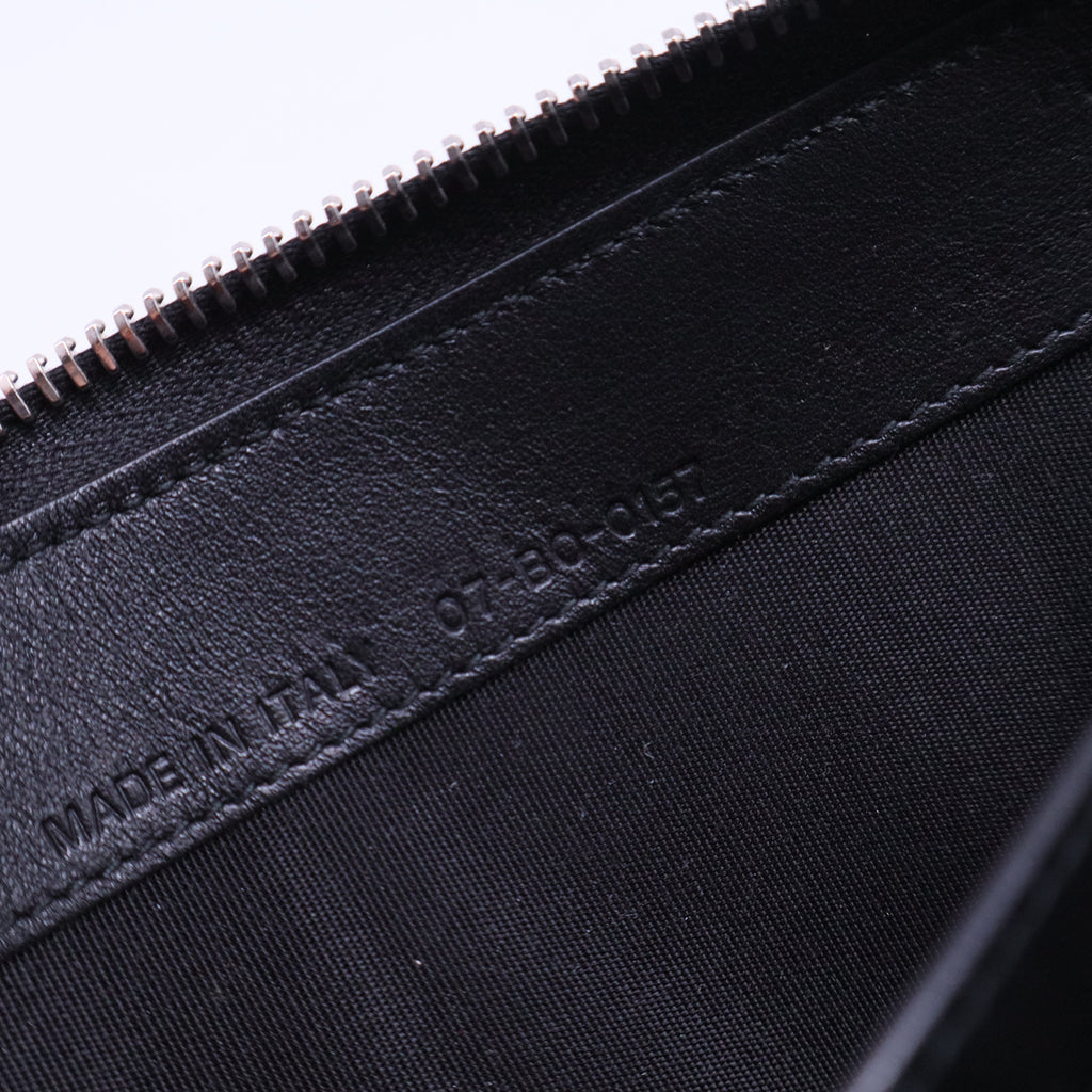 Black leather wallet with a metal bee motif W20553
