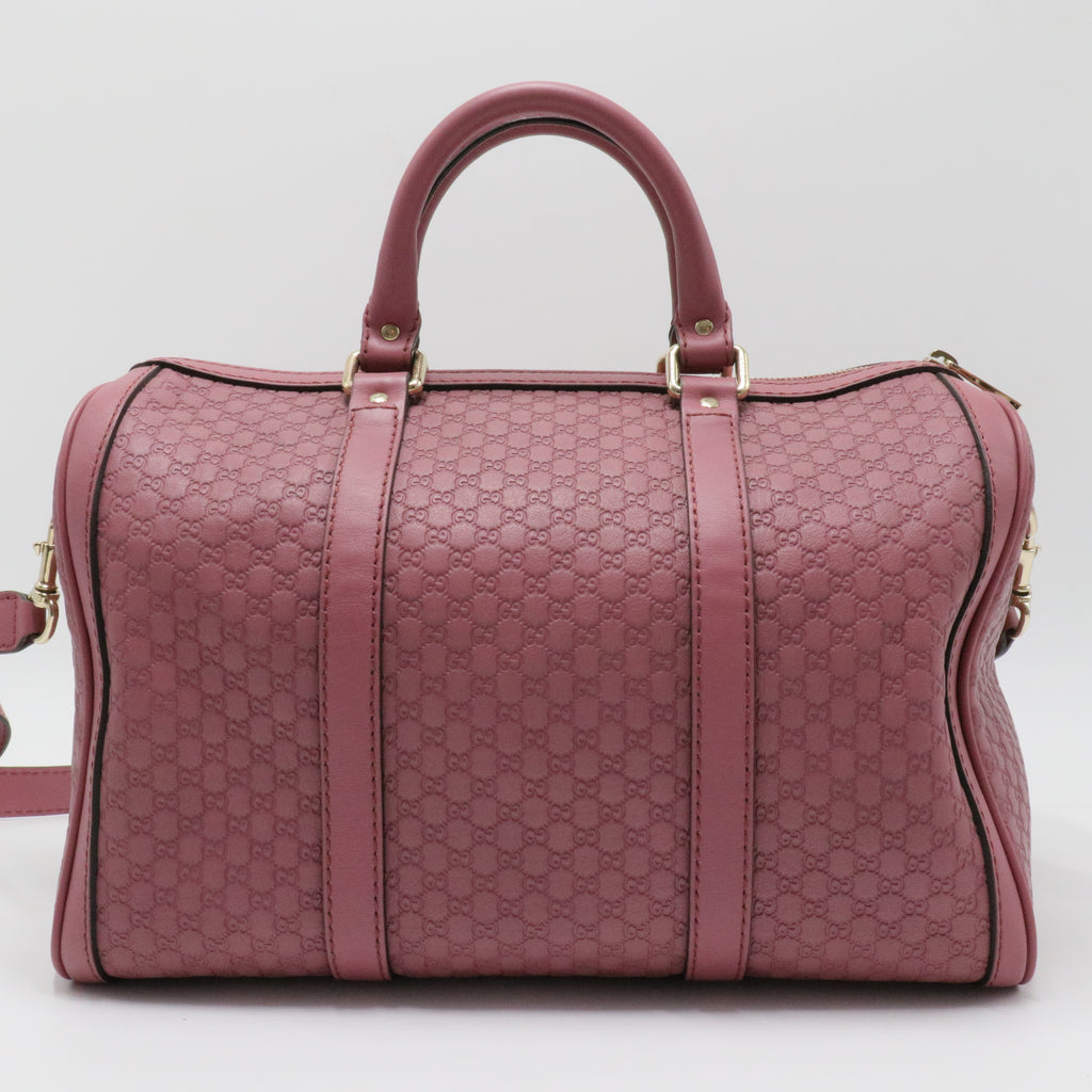 Joy Boston Bag Microguccissima Leather Medium