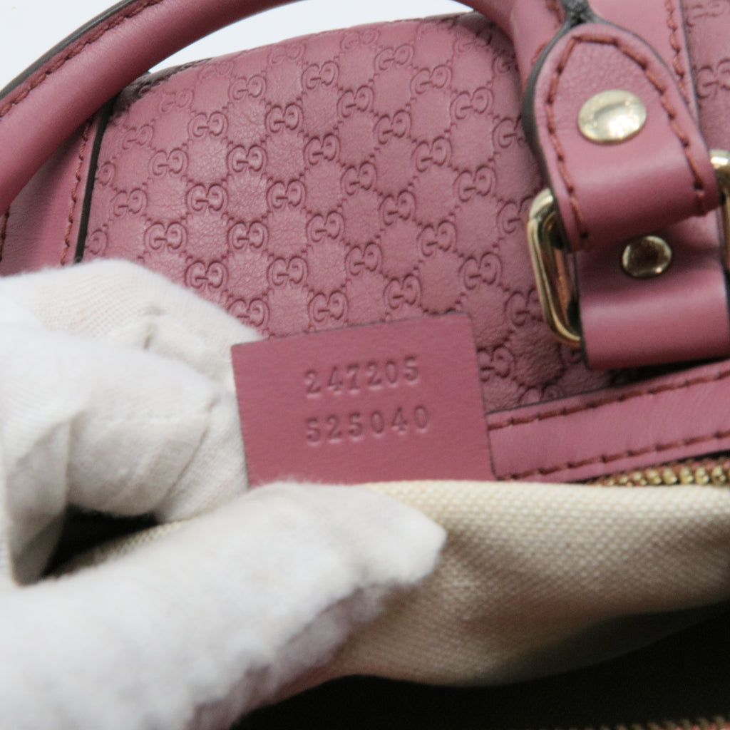 Joy Boston Bag Microguccissima Leather Medium