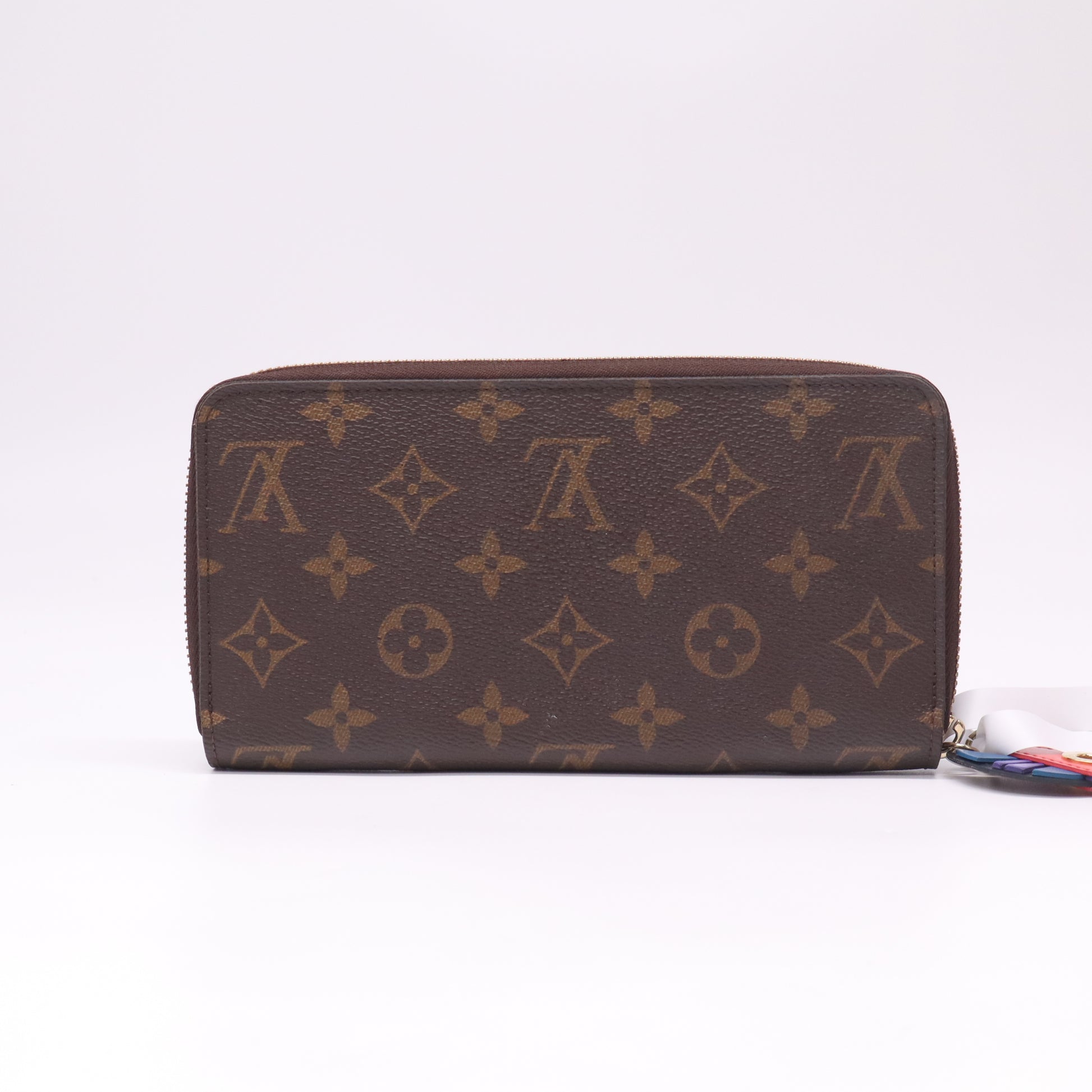 Zippy Wallet Limited Edition Totem Monogram Canvas W22526