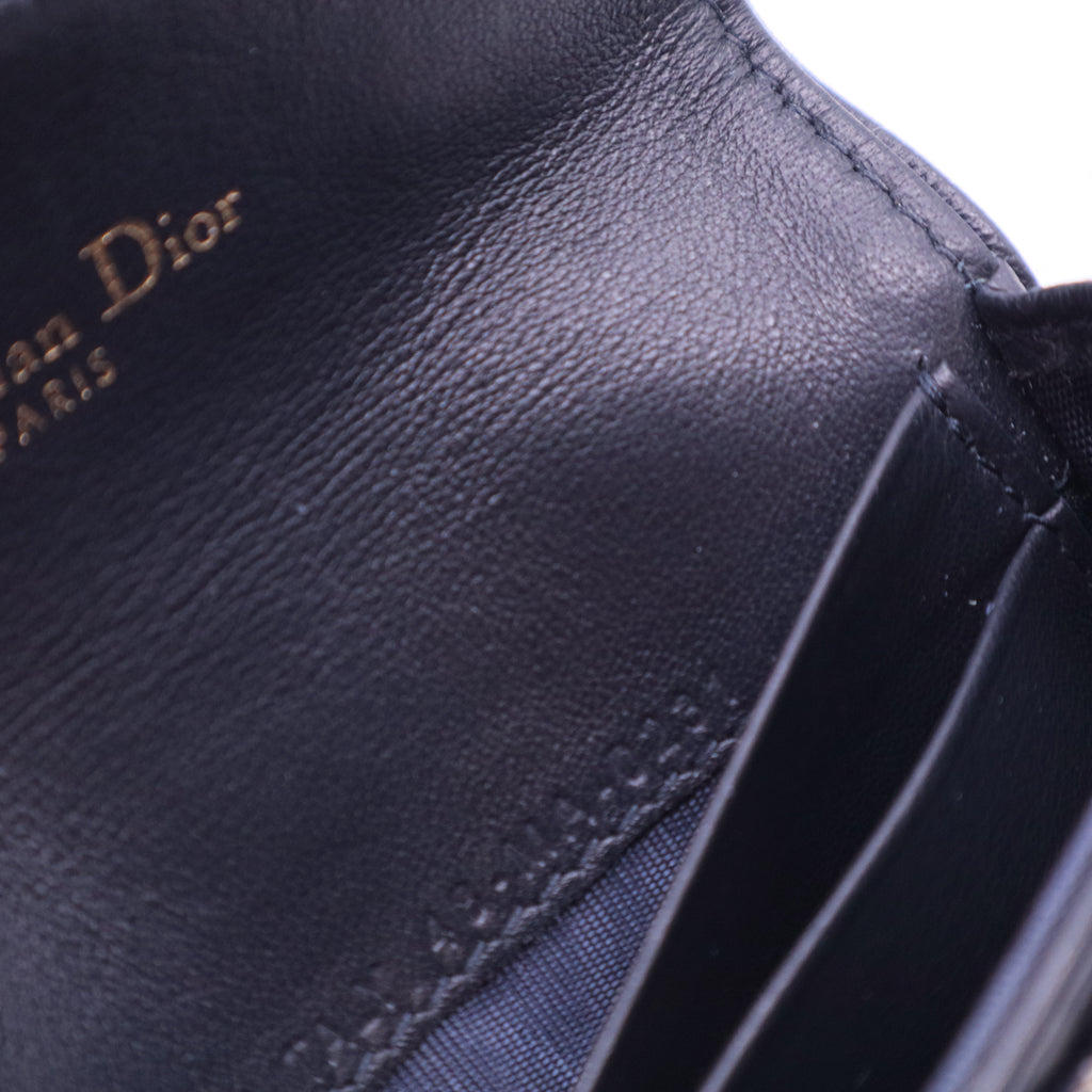 Oblique Monogram Saddle Flip Card Holder