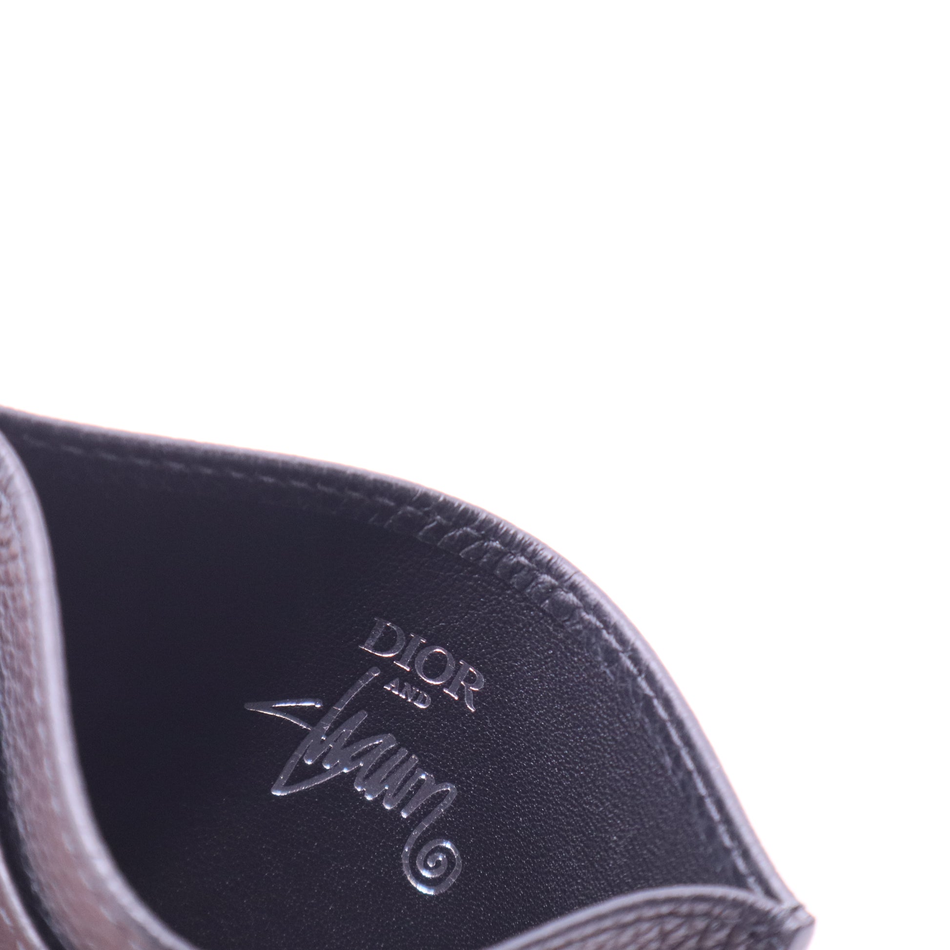 Dior x Shawn Stussy collaboration bee-patterned card holder