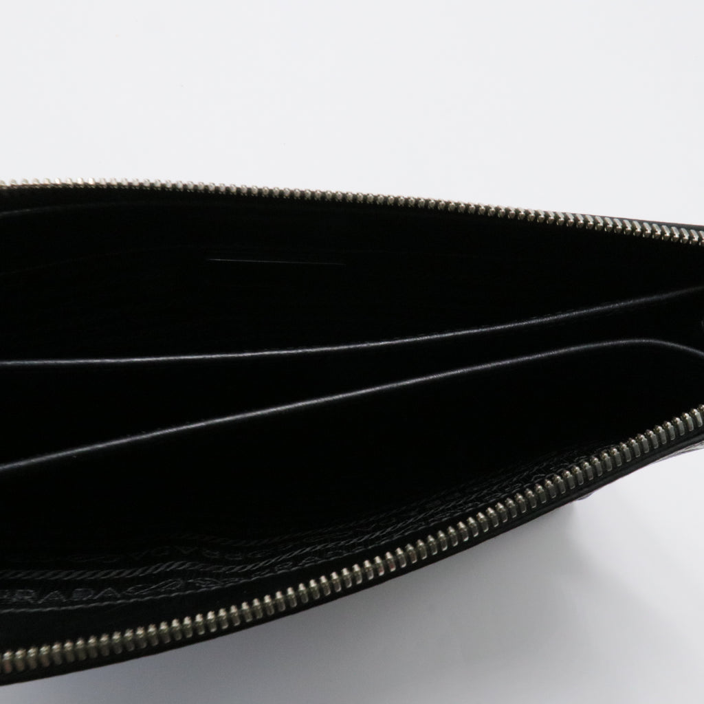 Saffiano enamel triangle logo zipped clutch