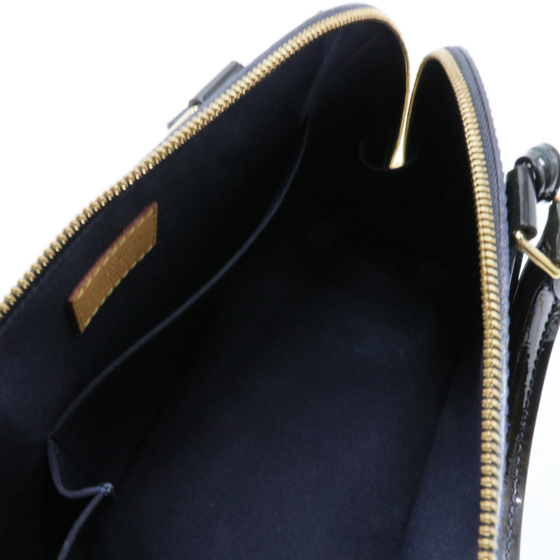 Alma Handbag Monogram Vernis PM