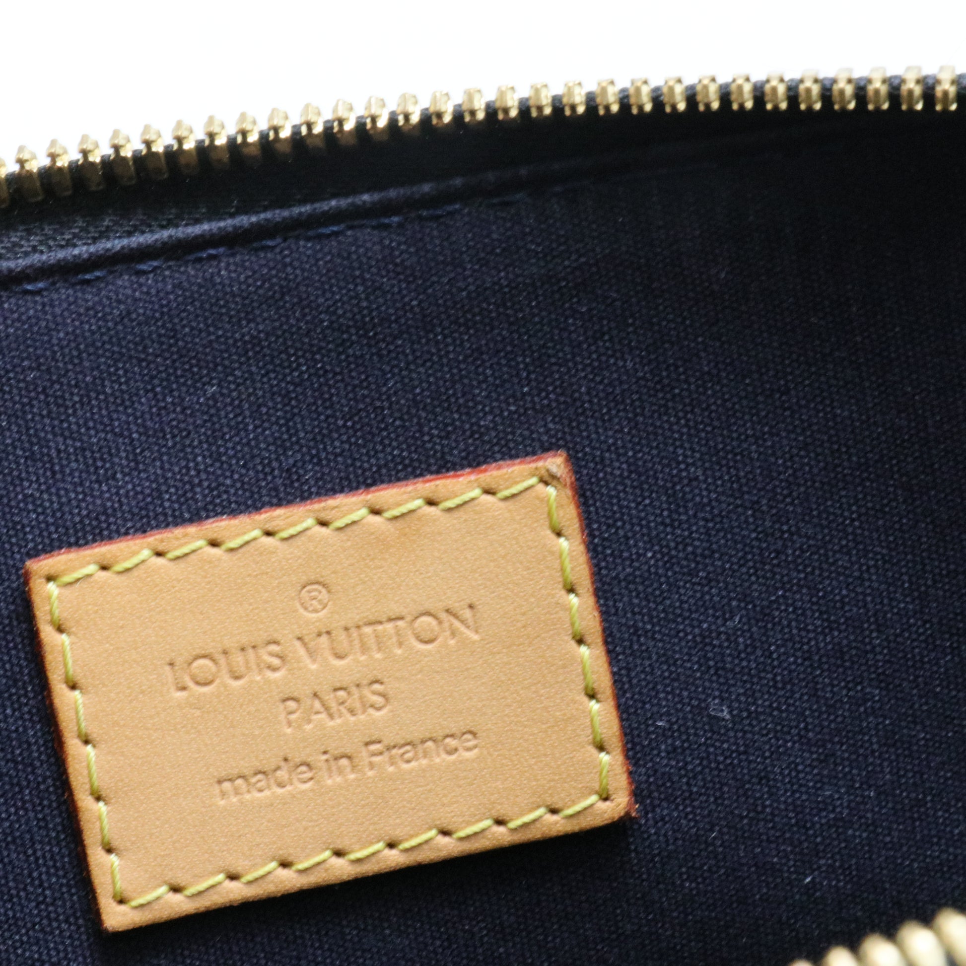 Alma Handbag Monogram Vernis PM