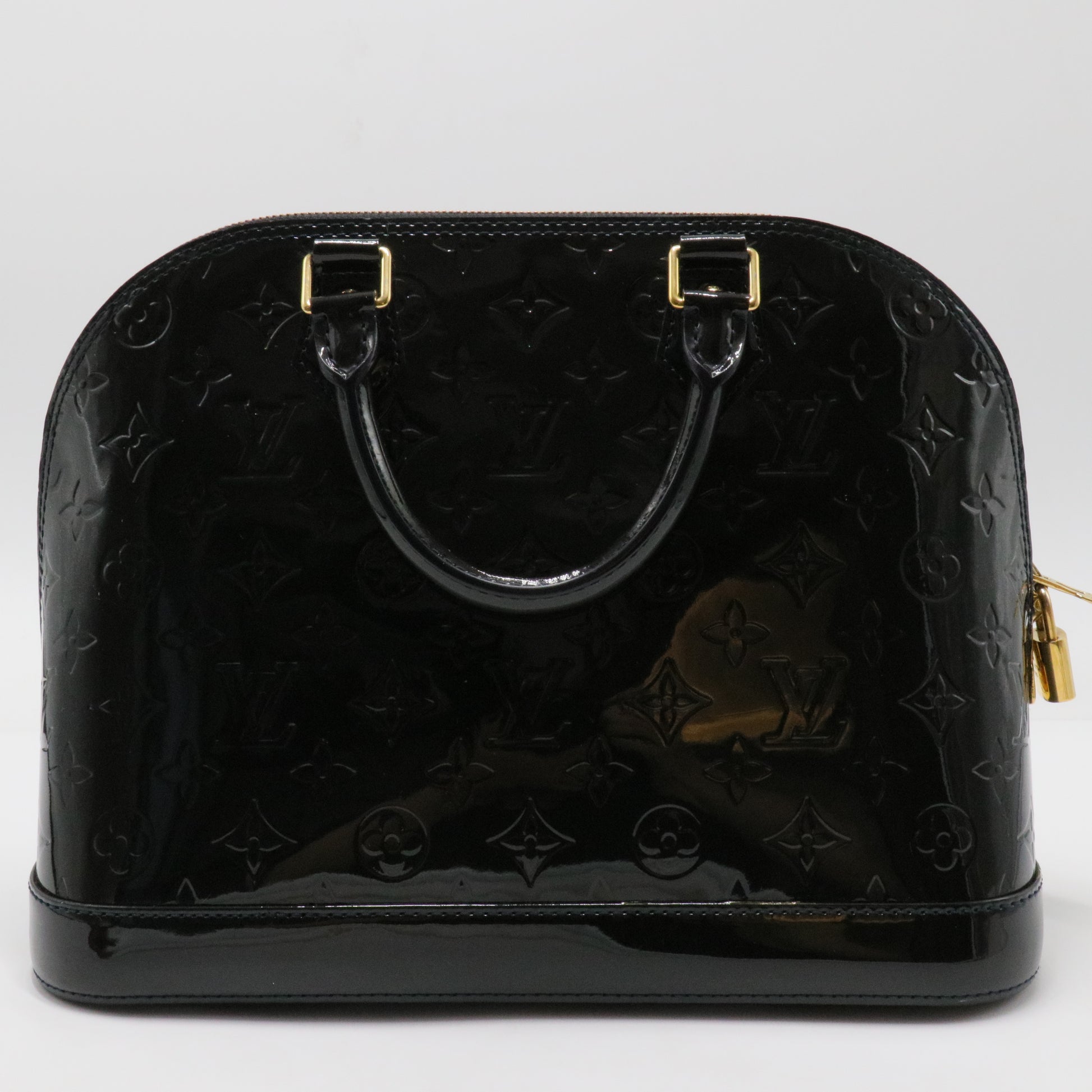 Alma Handbag Monogram Vernis PM