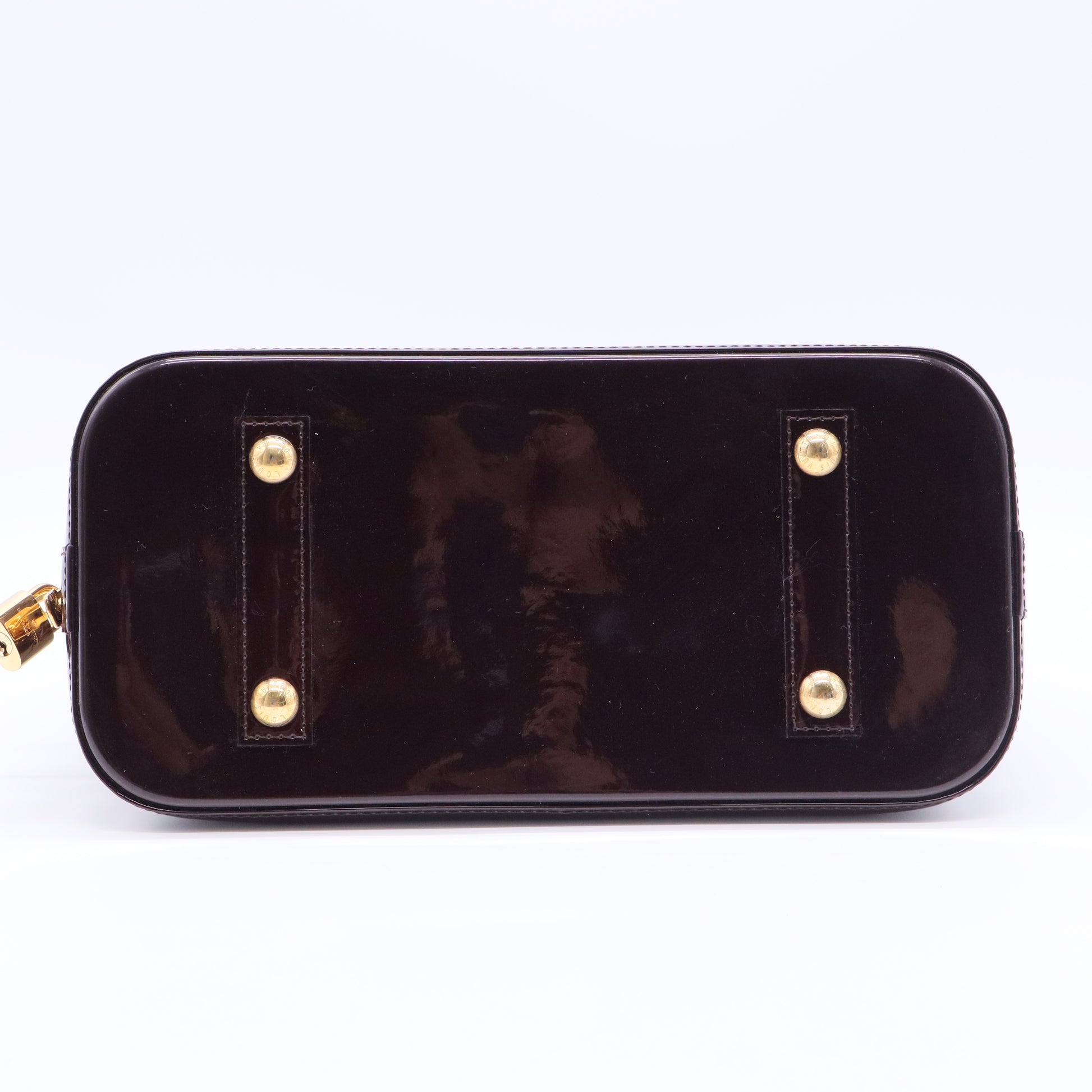 Alma Handbag Monogram Vernis PM