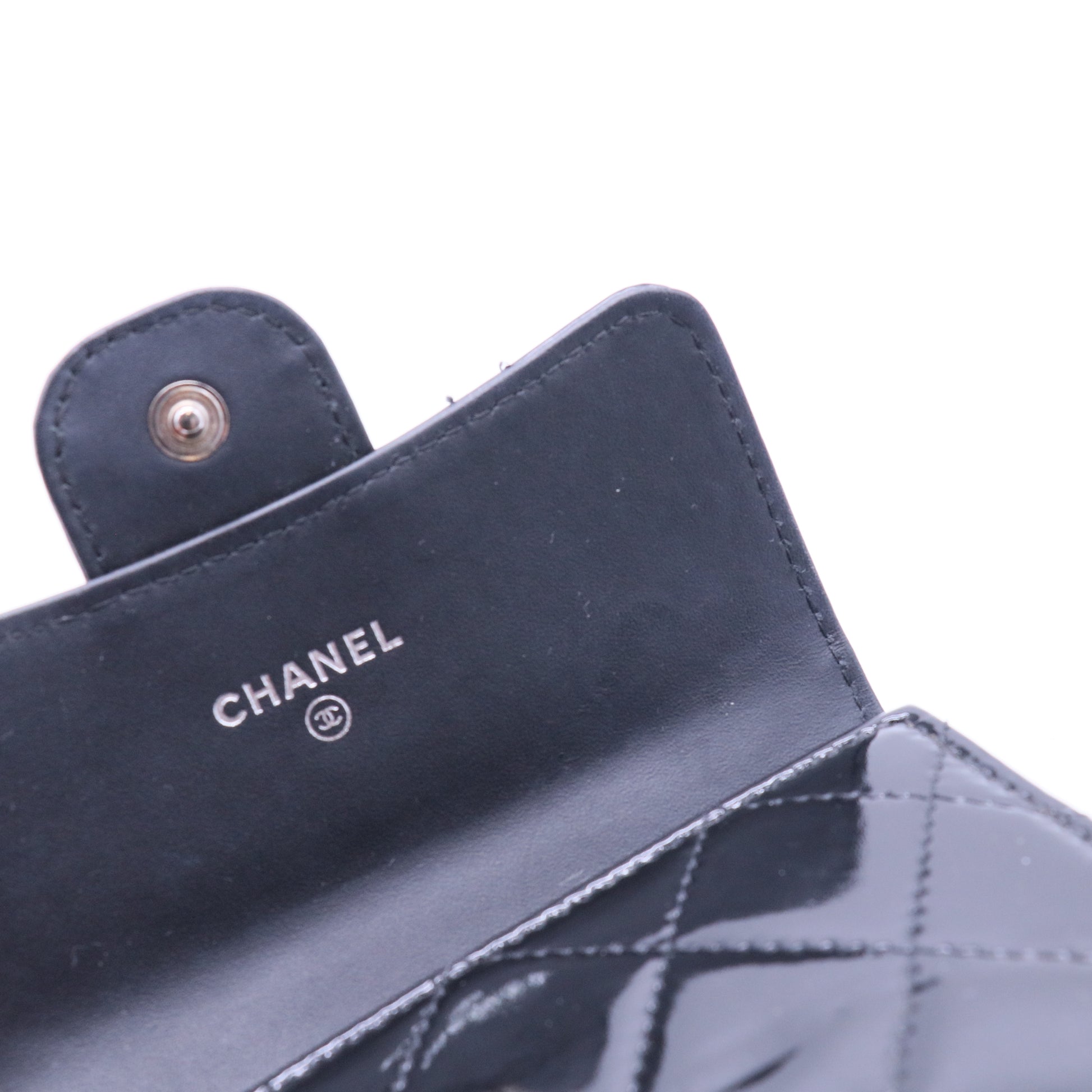 Chanel patent leather card case with silver clasp twins