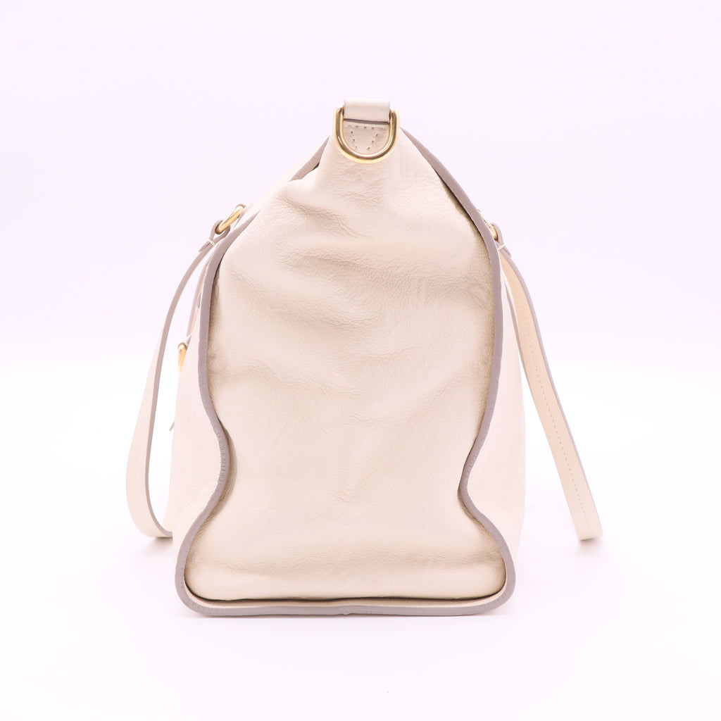 Lumineuse Handbag Monogram Empreinte Leather PM Twins