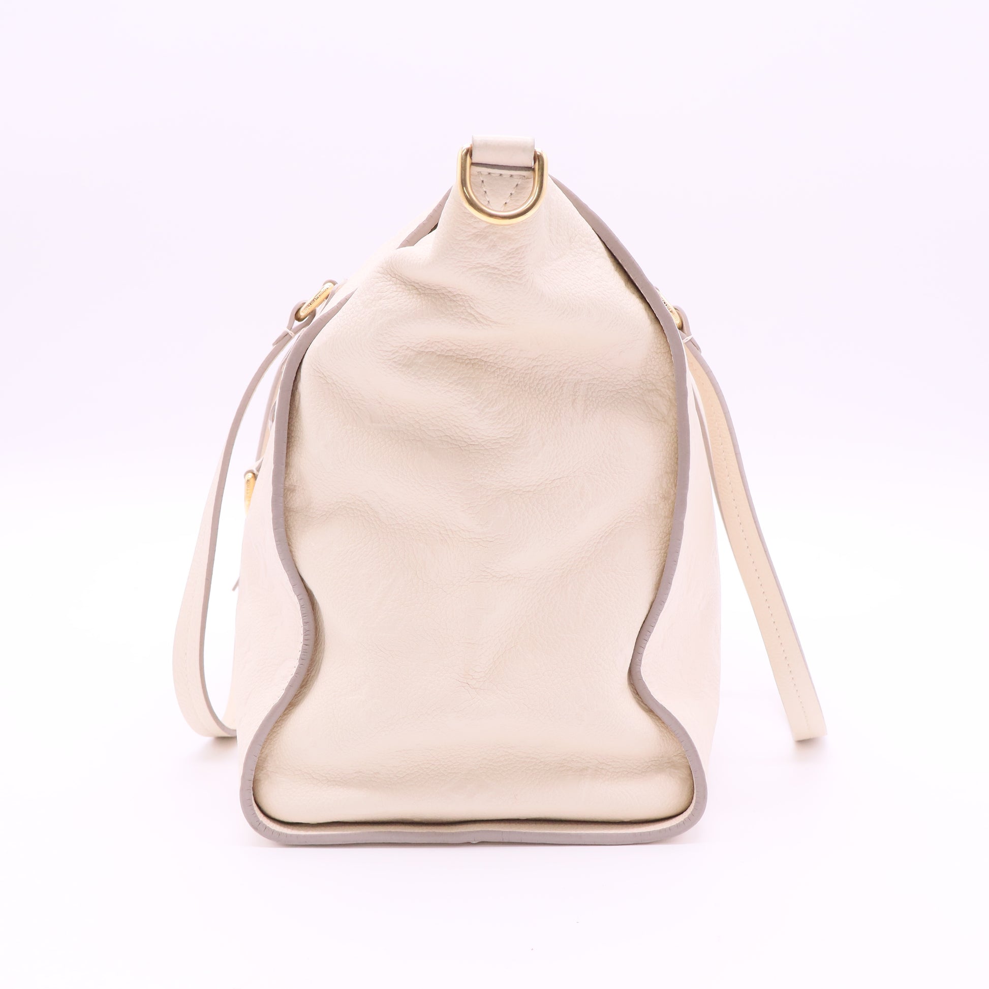 Lumineuse Handbag Monogram Empreinte Leather PM Twins