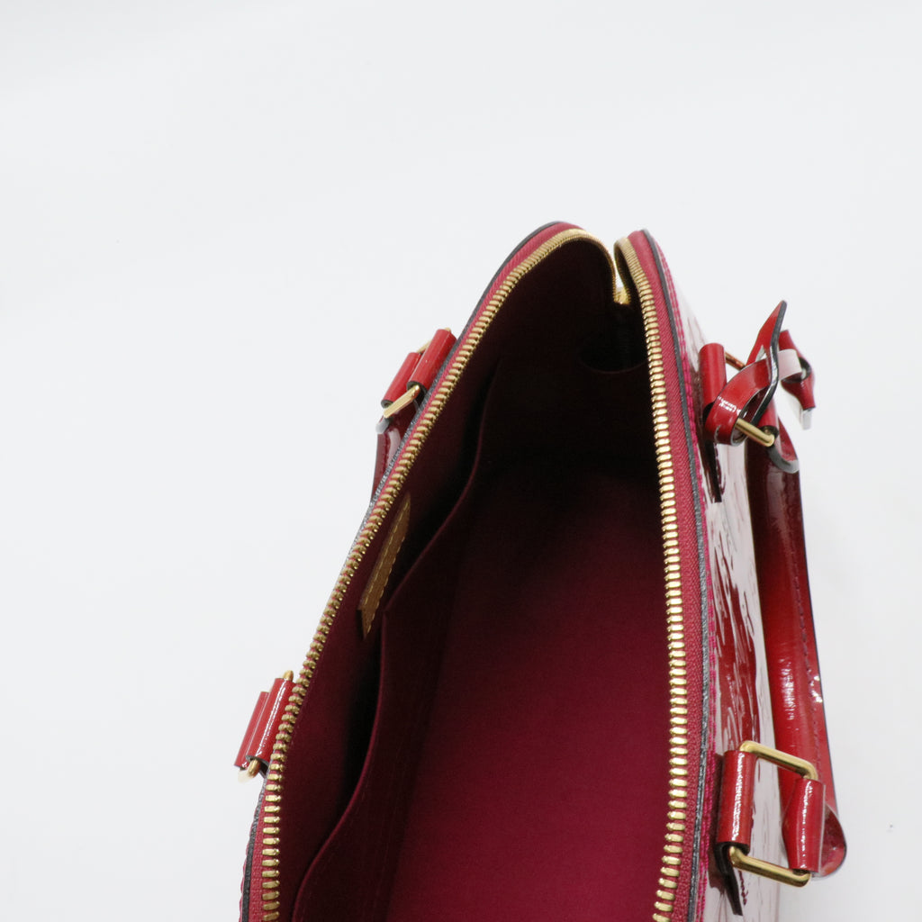 Alma Handbag Monogram Vernis PM