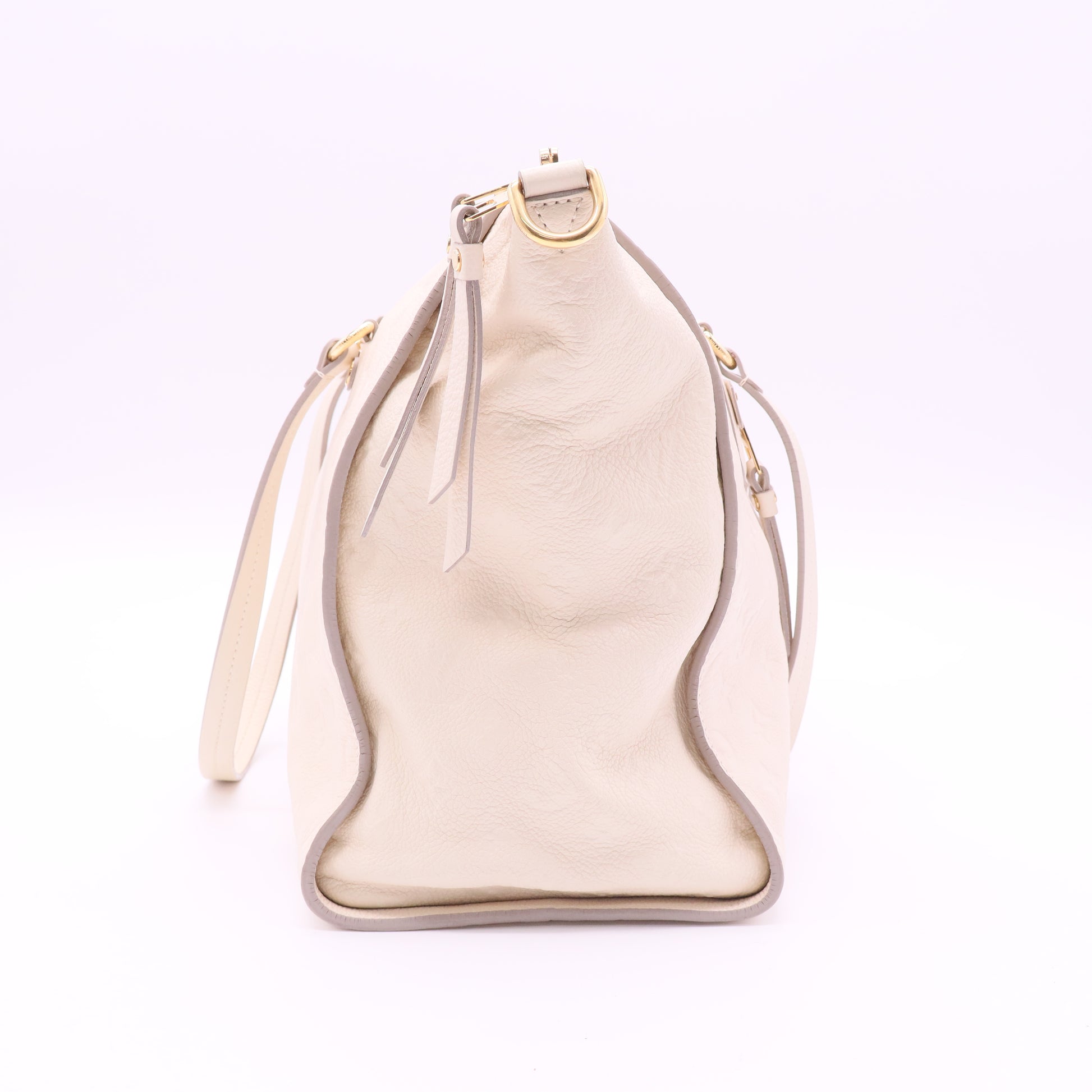 Lumineuse Handbag Monogram Empreinte Leather PM Twins