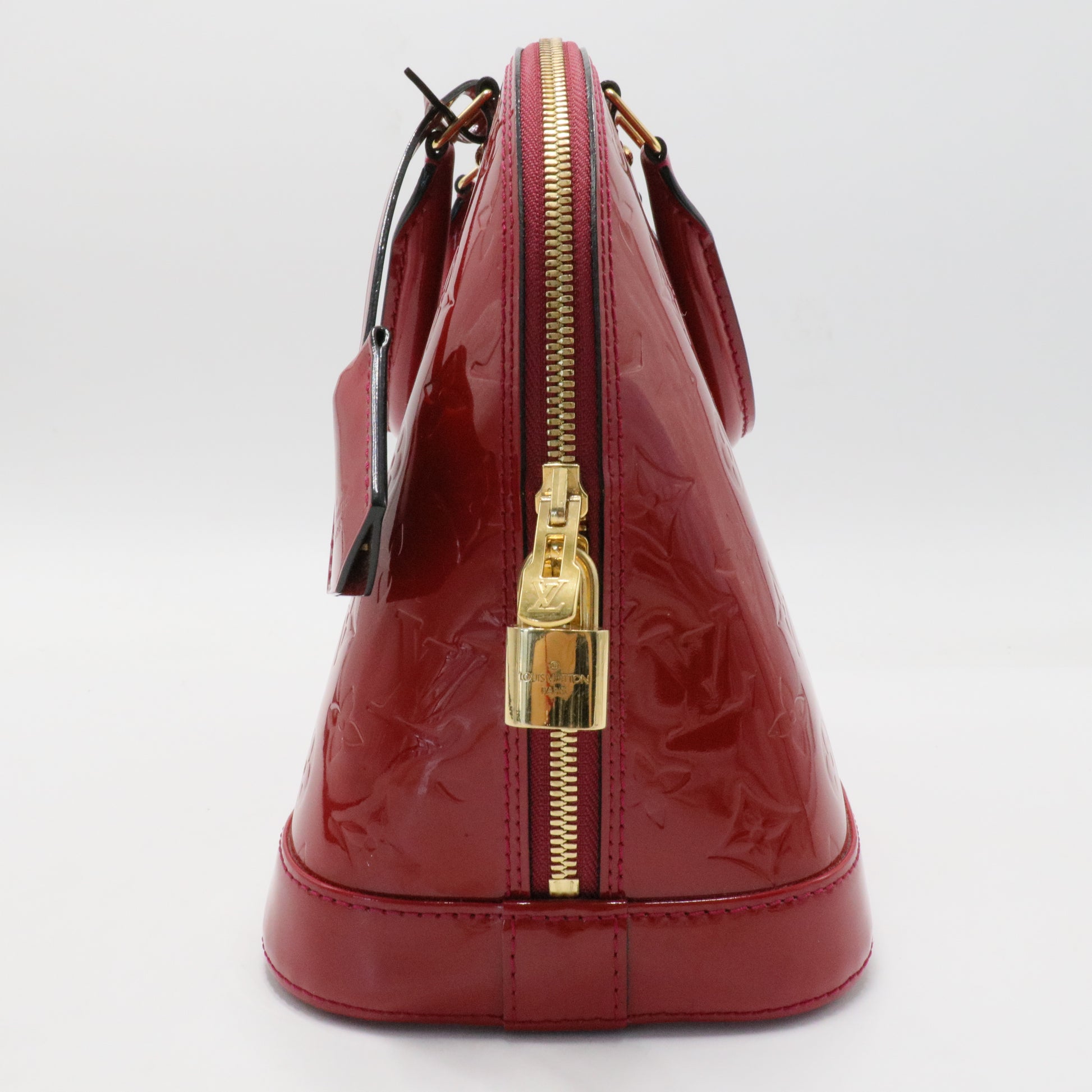 Alma Handbag Monogram Vernis PM