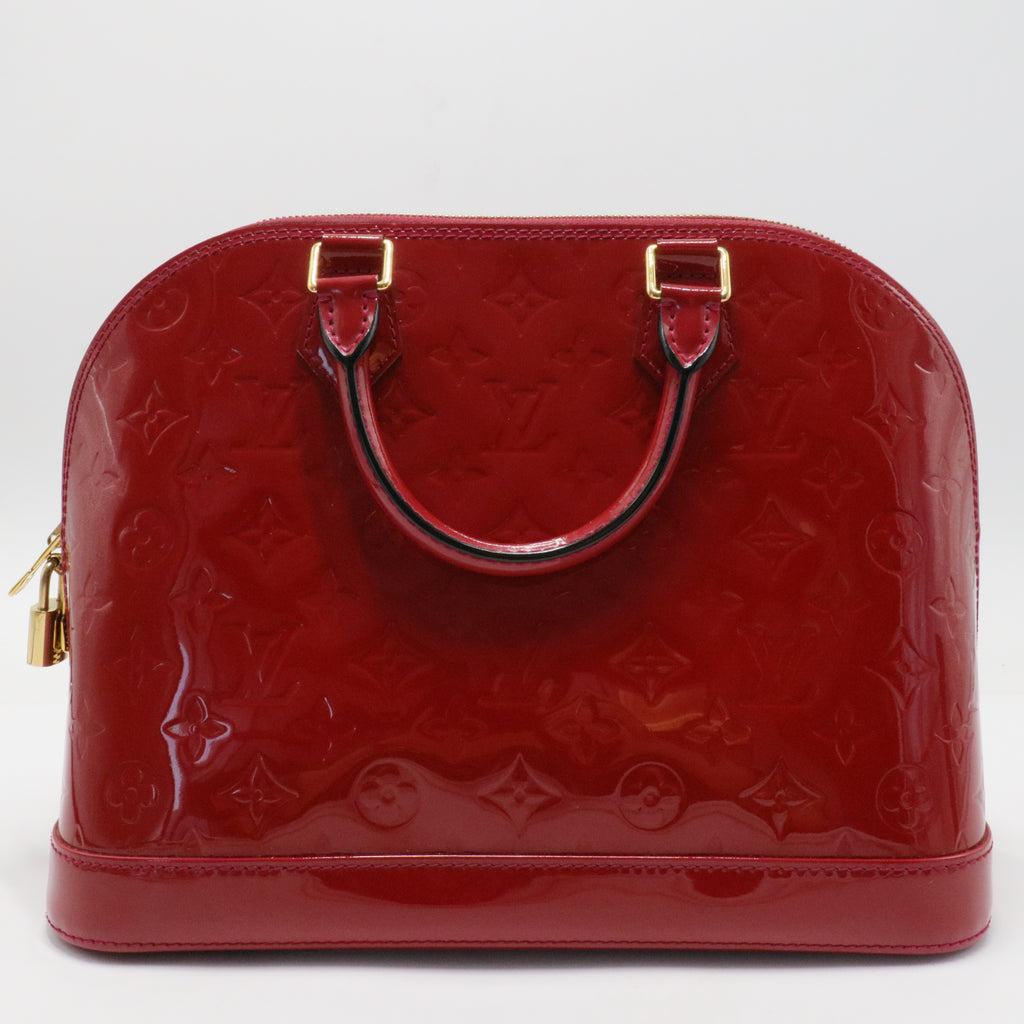 Alma Handbag Monogram Vernis PM