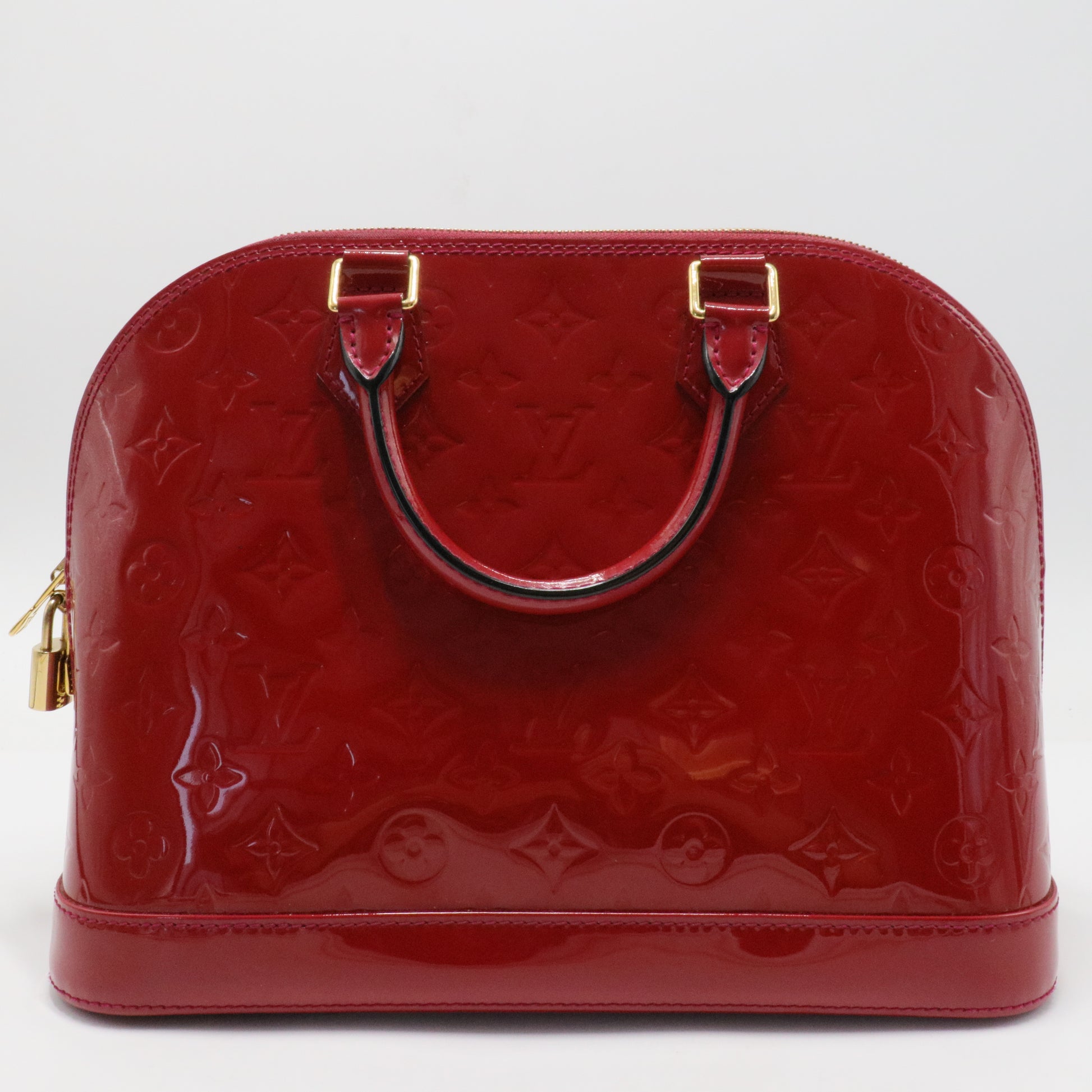 Alma Handbag Monogram Vernis PM