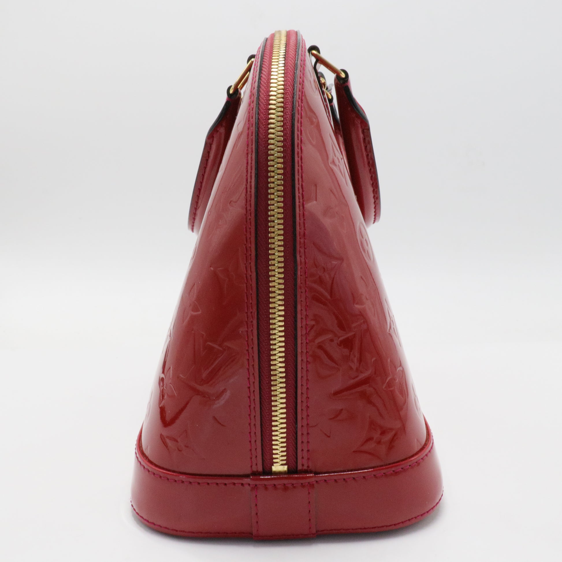 Alma Handbag Monogram Vernis PM