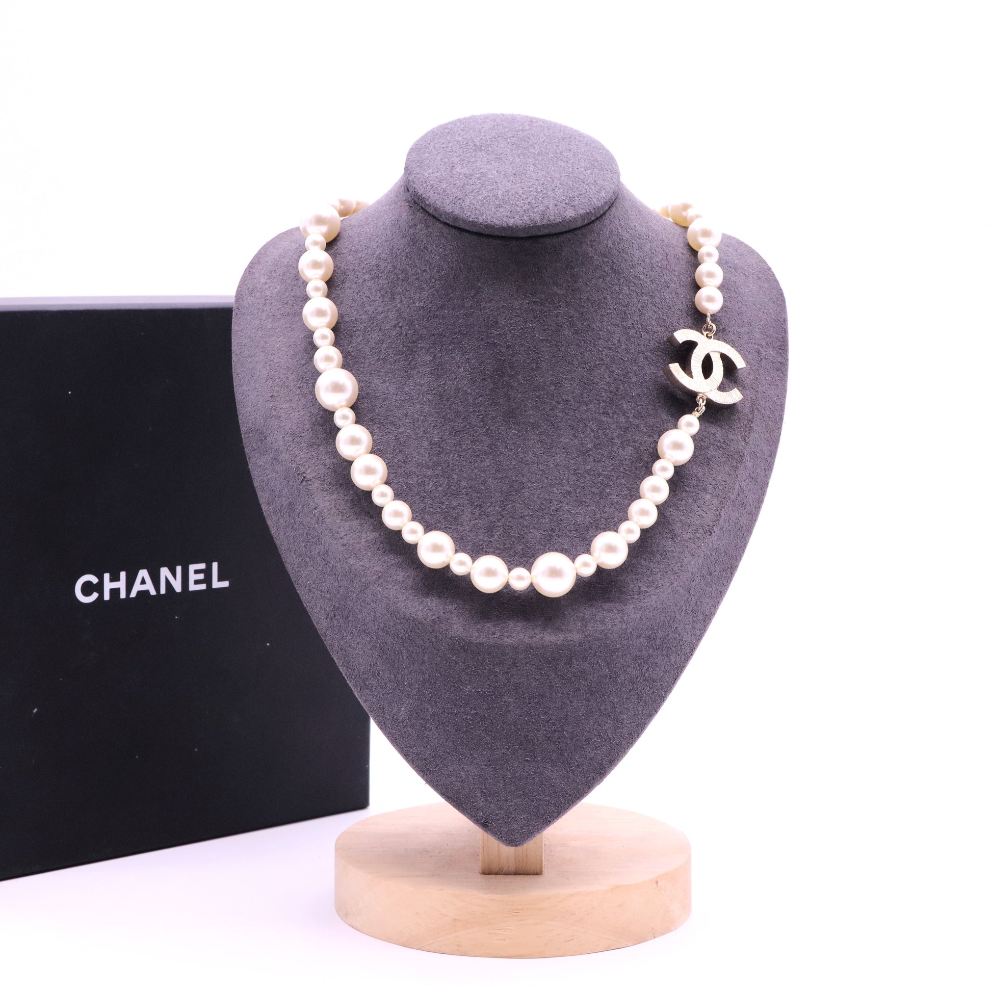 Pearl Necklace with Gold Emblem