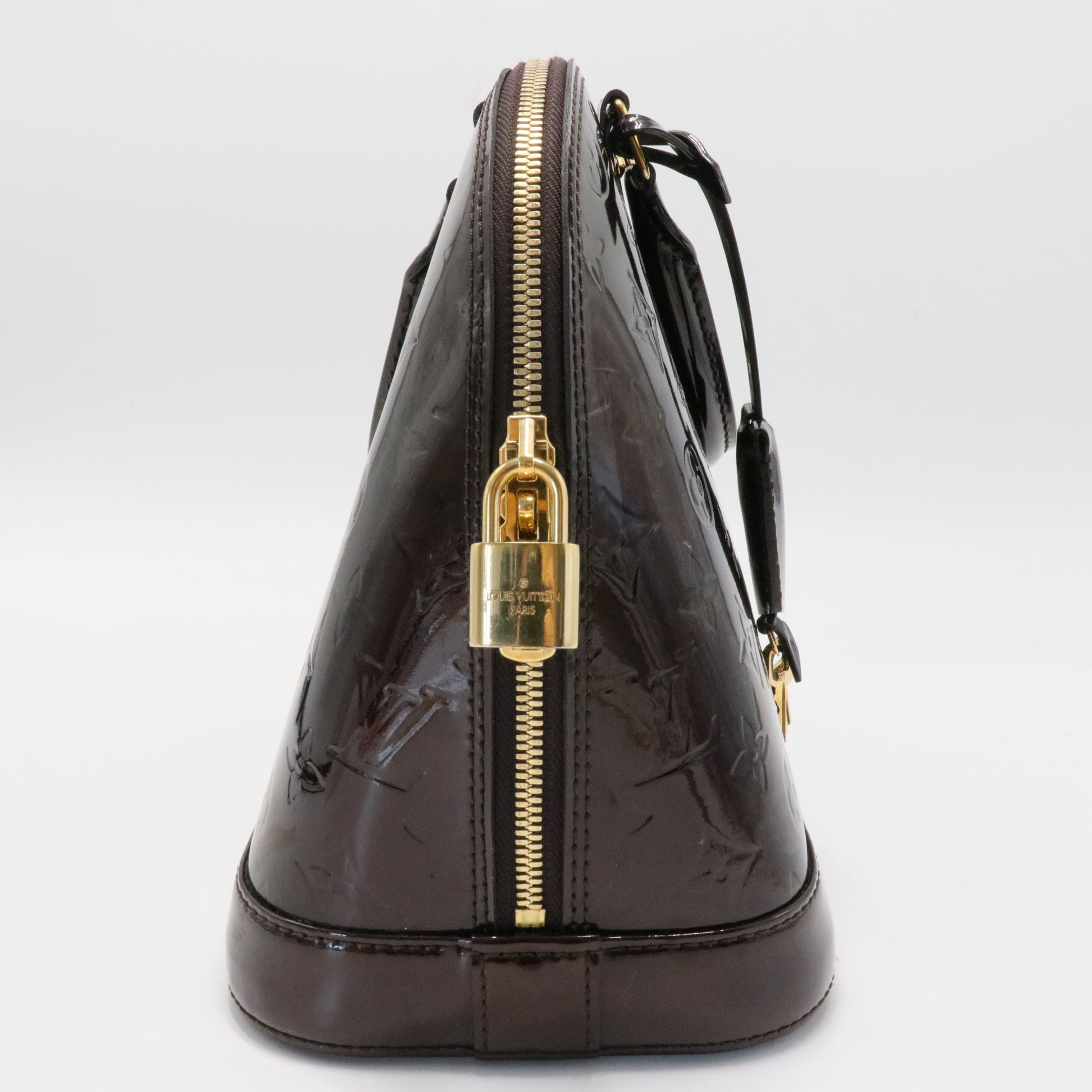 Alma Handbag Monogram Vernis PM