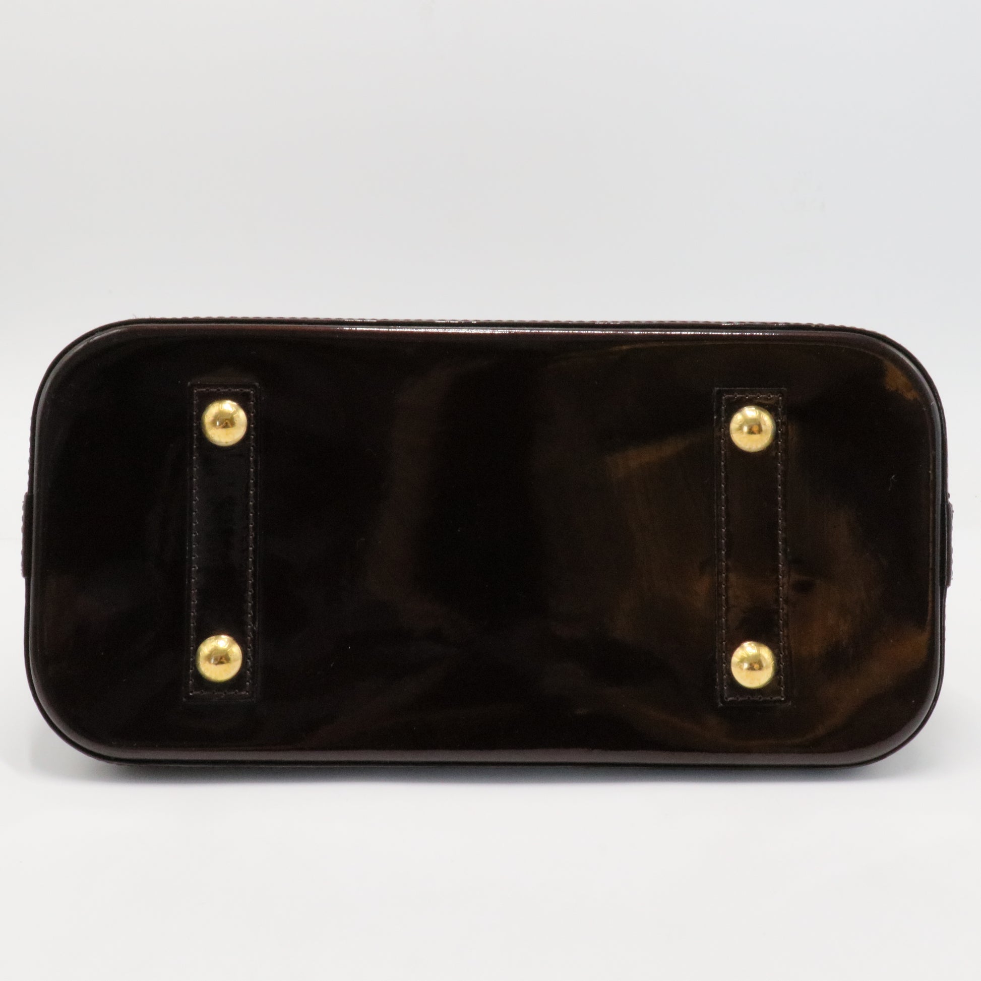 Alma Handbag Monogram Vernis PM