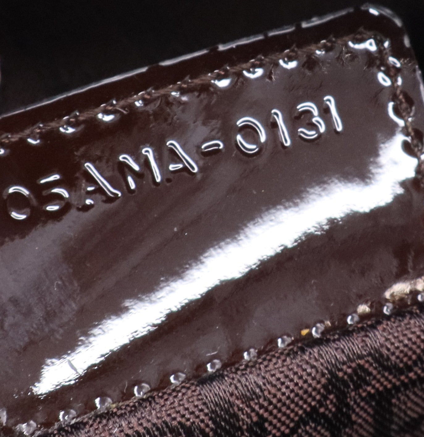 Lady Dior patent leather handbag