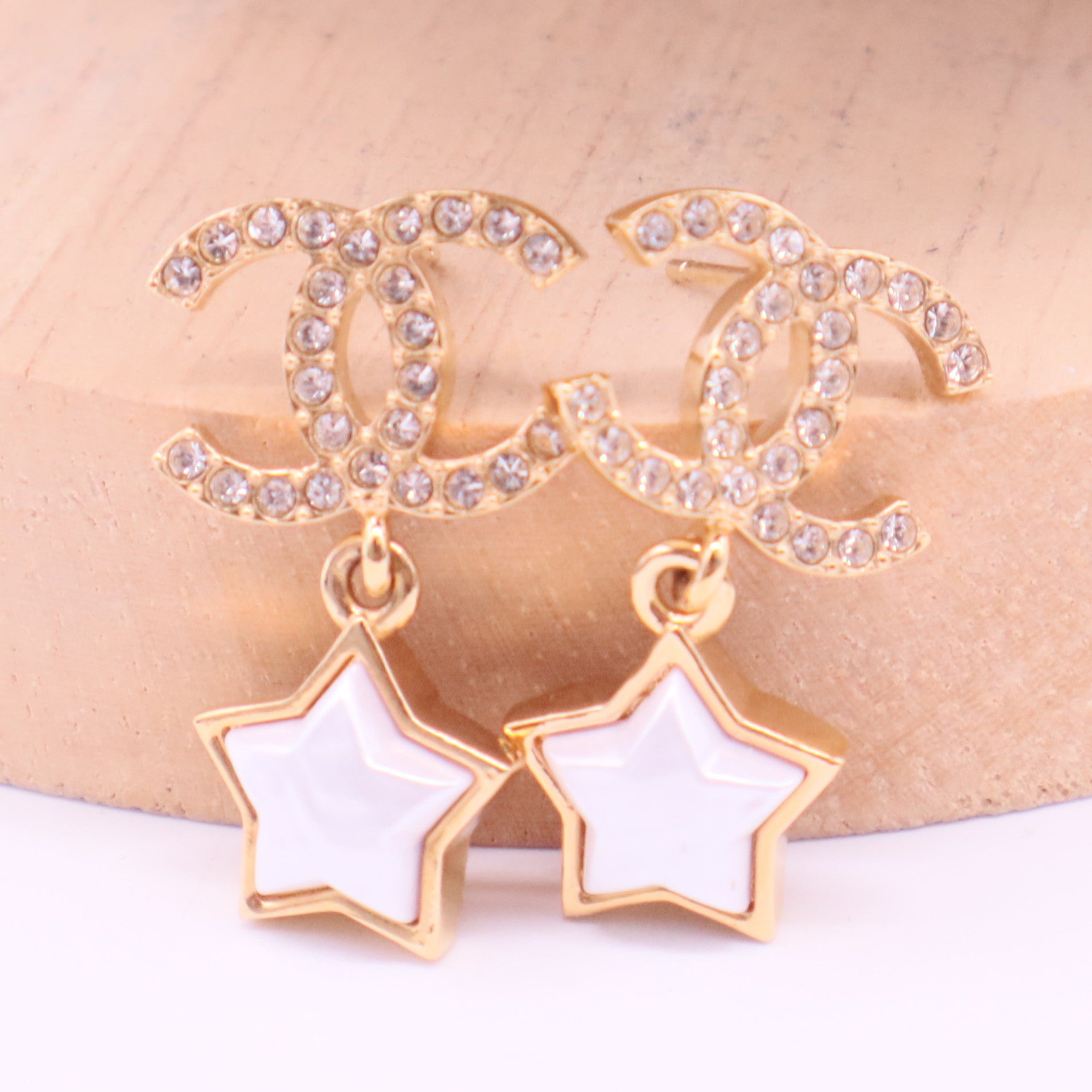 CC Logo Star Earrings Metal twins
