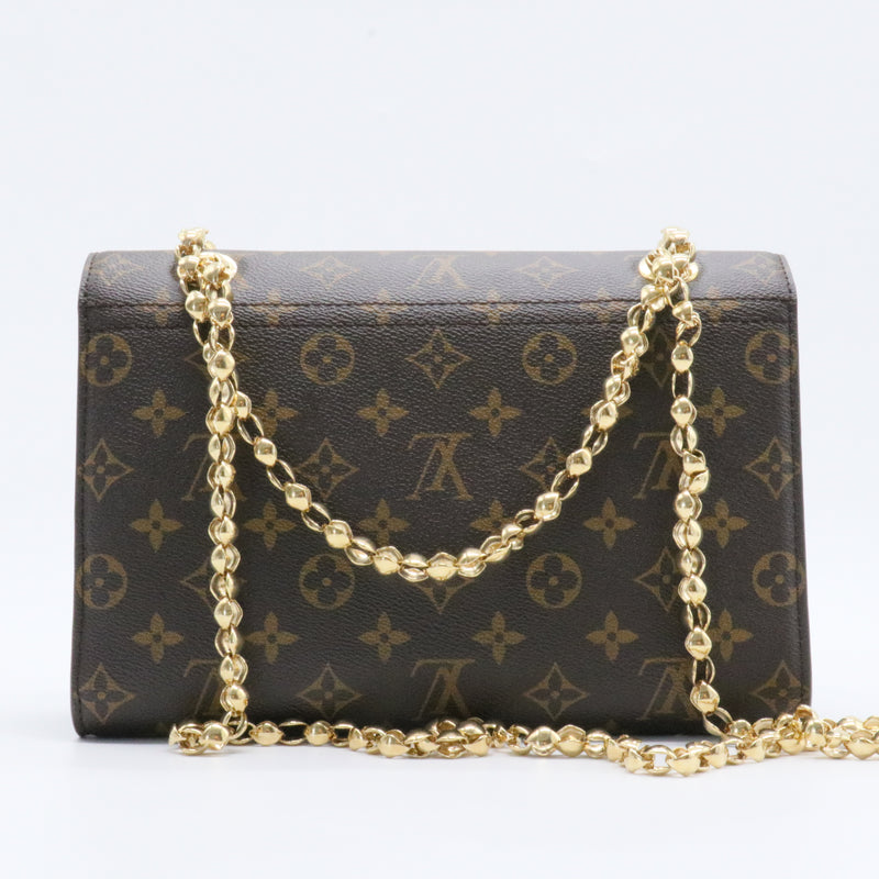 Victoire Handbag Monogram Canvas and Leather